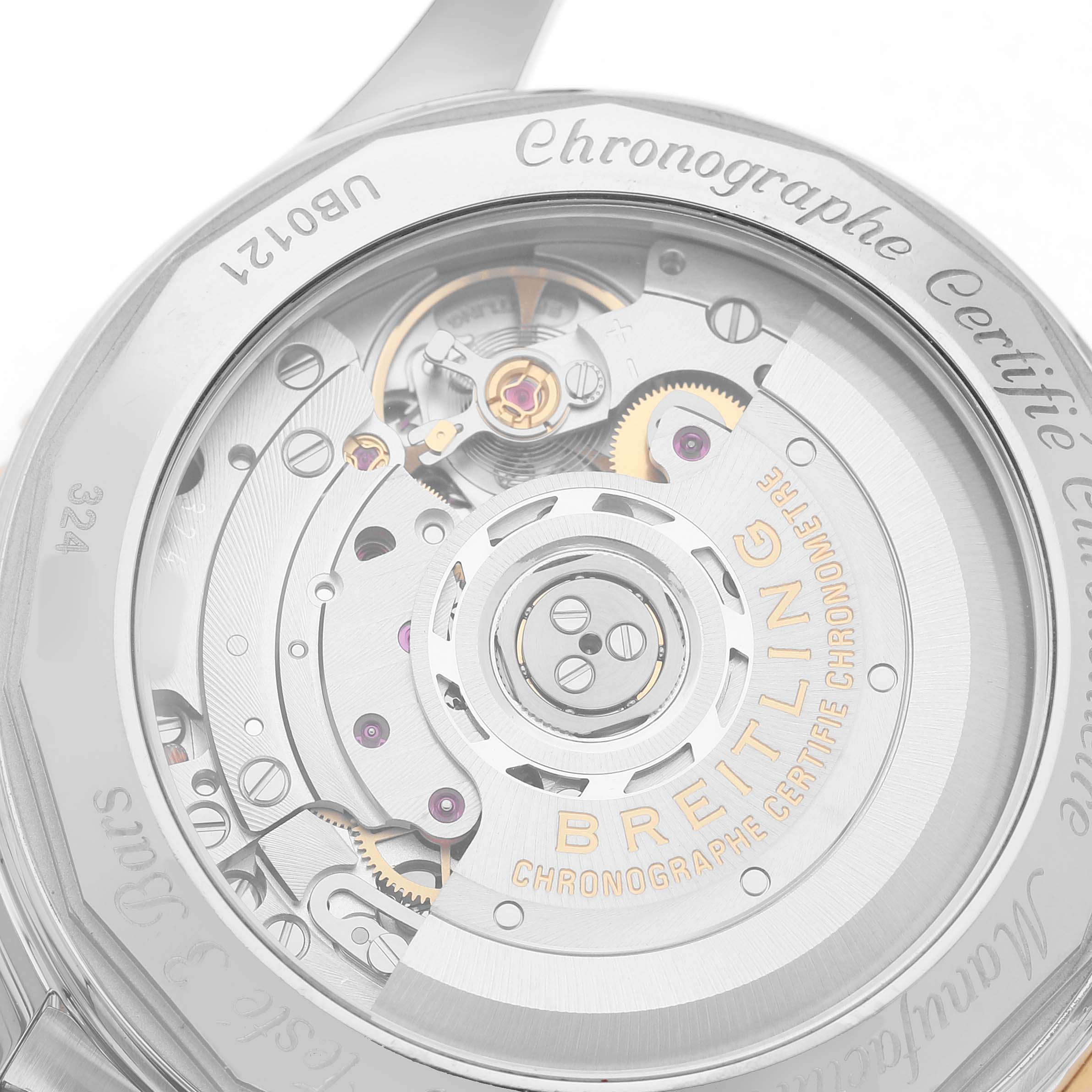 The image shows a close-up view of the Breitling Navitimer UB0121 Men's Stainless Steel Grey Dial's intricate movement from the back.