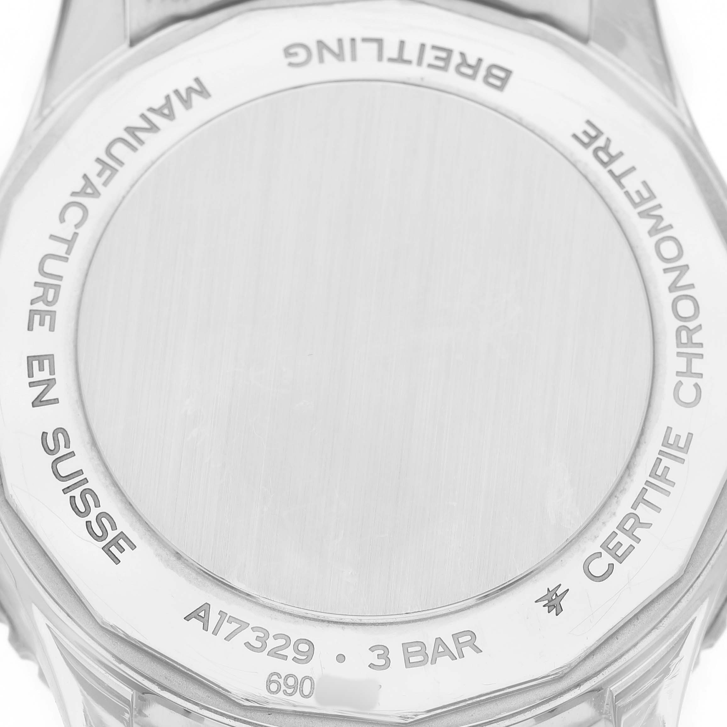The image shows the back case of a Breitling Navitimer A17329 Men's Stainless Steel Blue Dial watch, displaying the model number and various inscriptions.