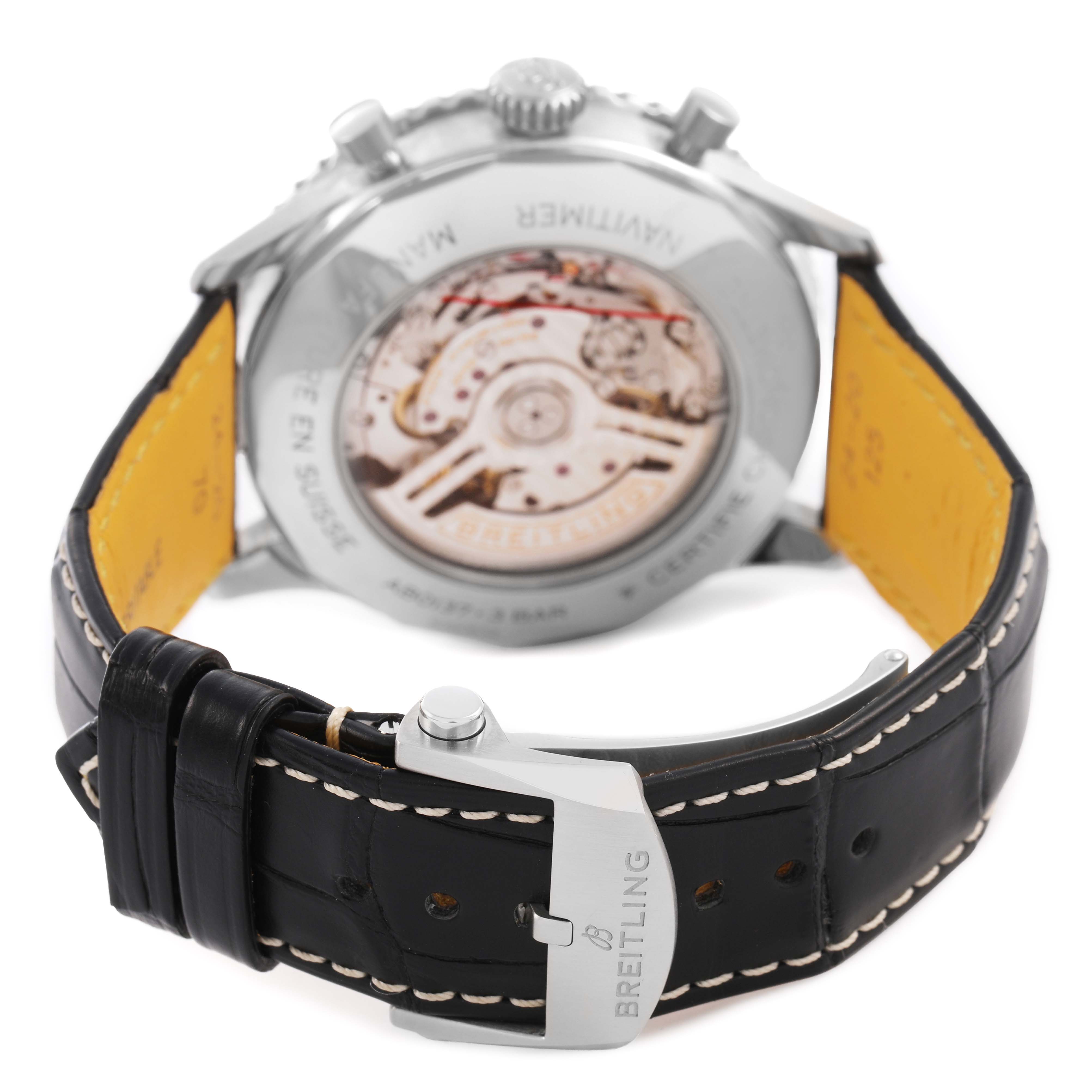 The image shows the back view of a Breitling Navitimer AB0137 Men's Stainless Steel Green Dial watch, highlighting the movement and black leather strap with a clasp.