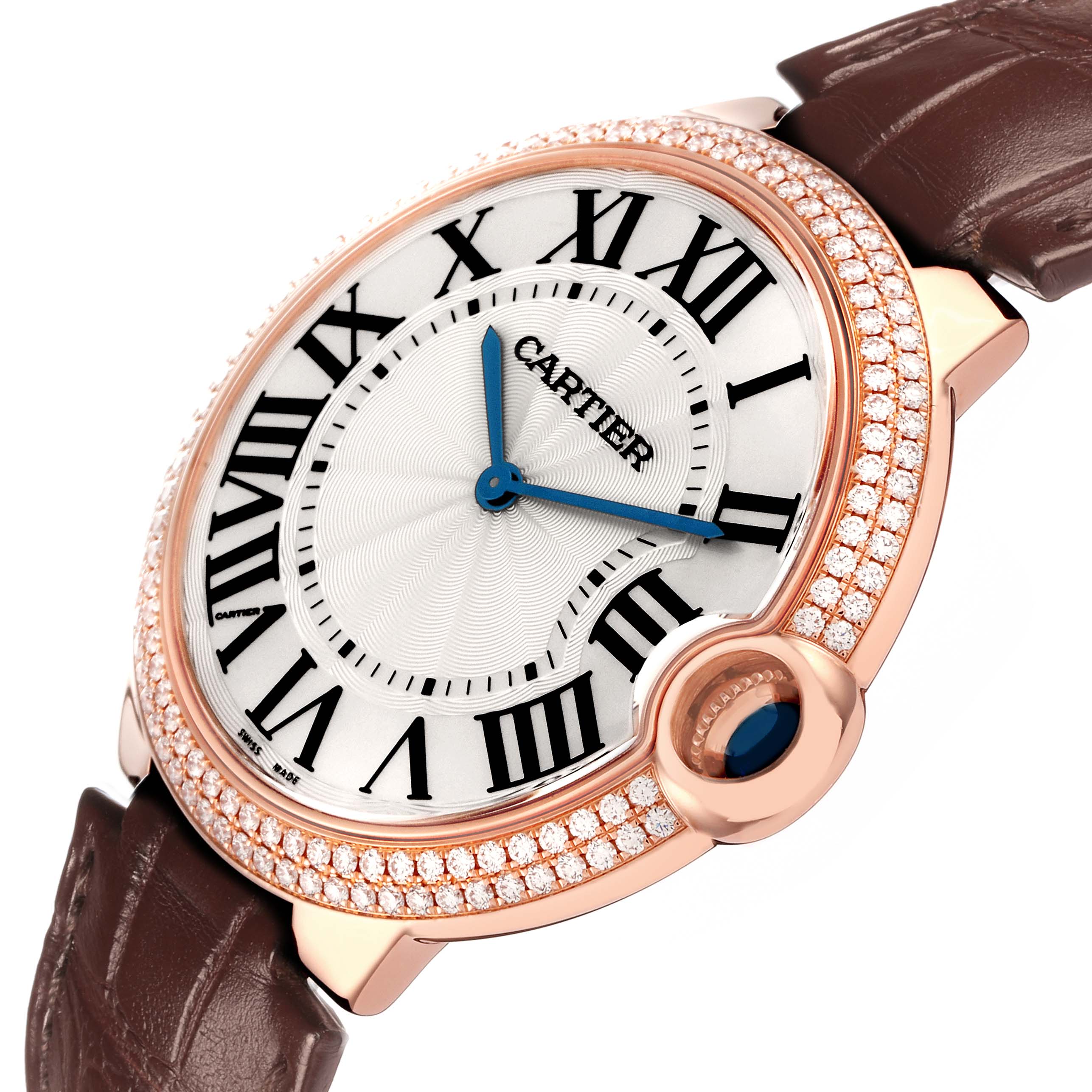 The image shows the Cartier Ballon Bleu model WE902055 at an angle highlighting its diamond-encrusted bezel, Roman numeral dial, and leather strap.