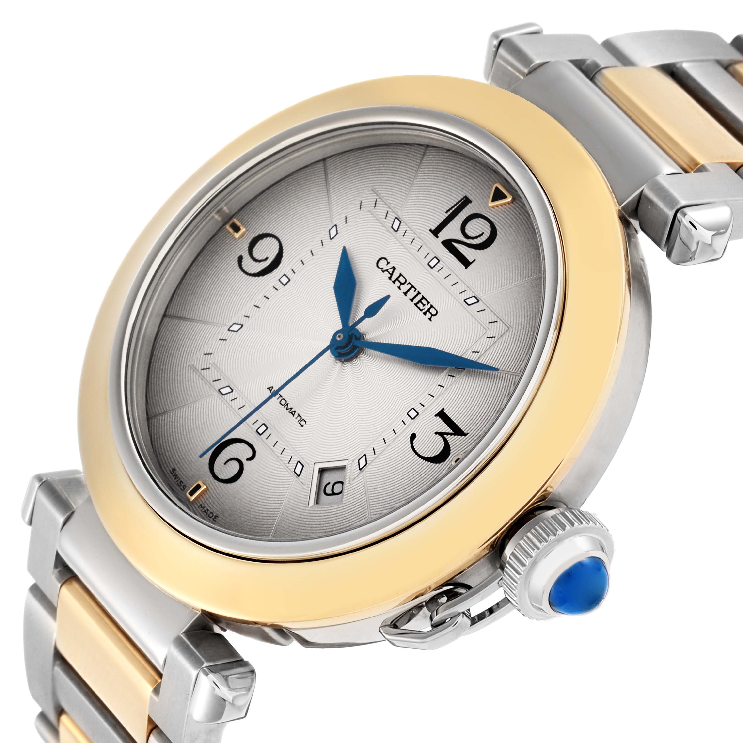 The image shows the Cartier Pasha W2PA0009 men
s watch from a front-side angle, highlighting the dial, bezel, crown, and part of the bracelet.