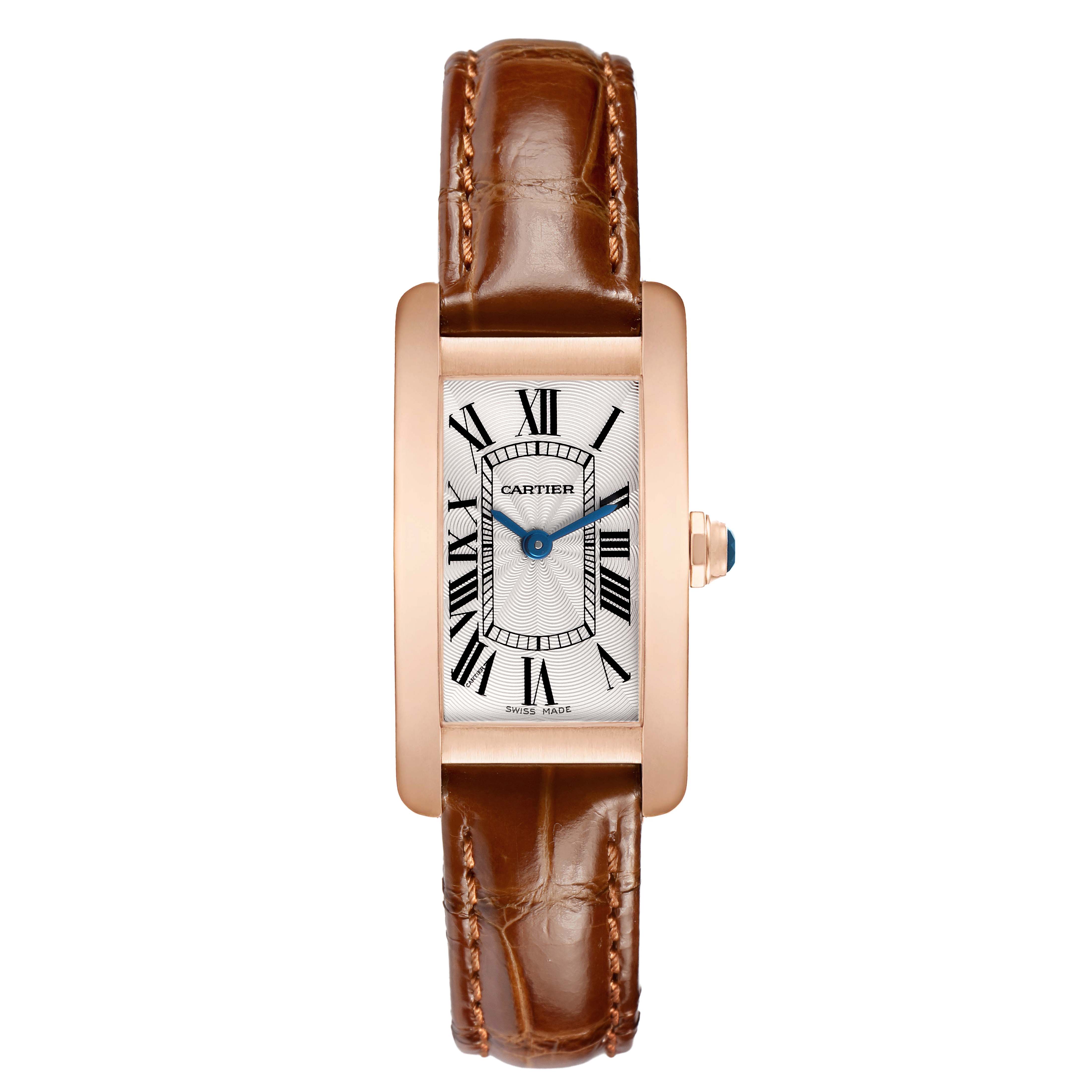 The Cartier Tank Américaine watch is shown from a top-down angle, displaying its rectangular face and brown leather strap.