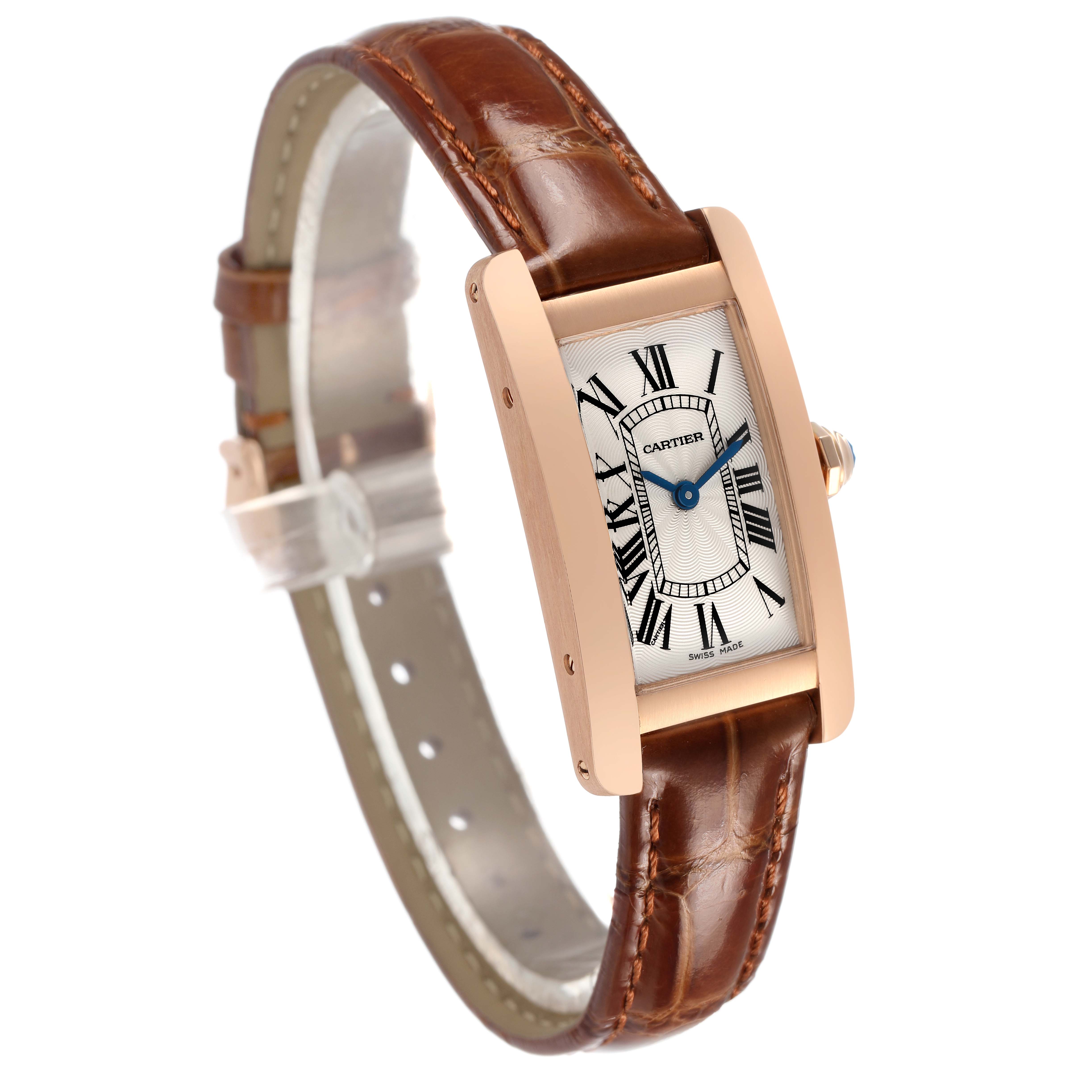 The Cartier Tank Americaine W2607456 Women's Rose Gold Silver Dial watch is shown at an angle highlighting the face, brown leather strap, and side crown.