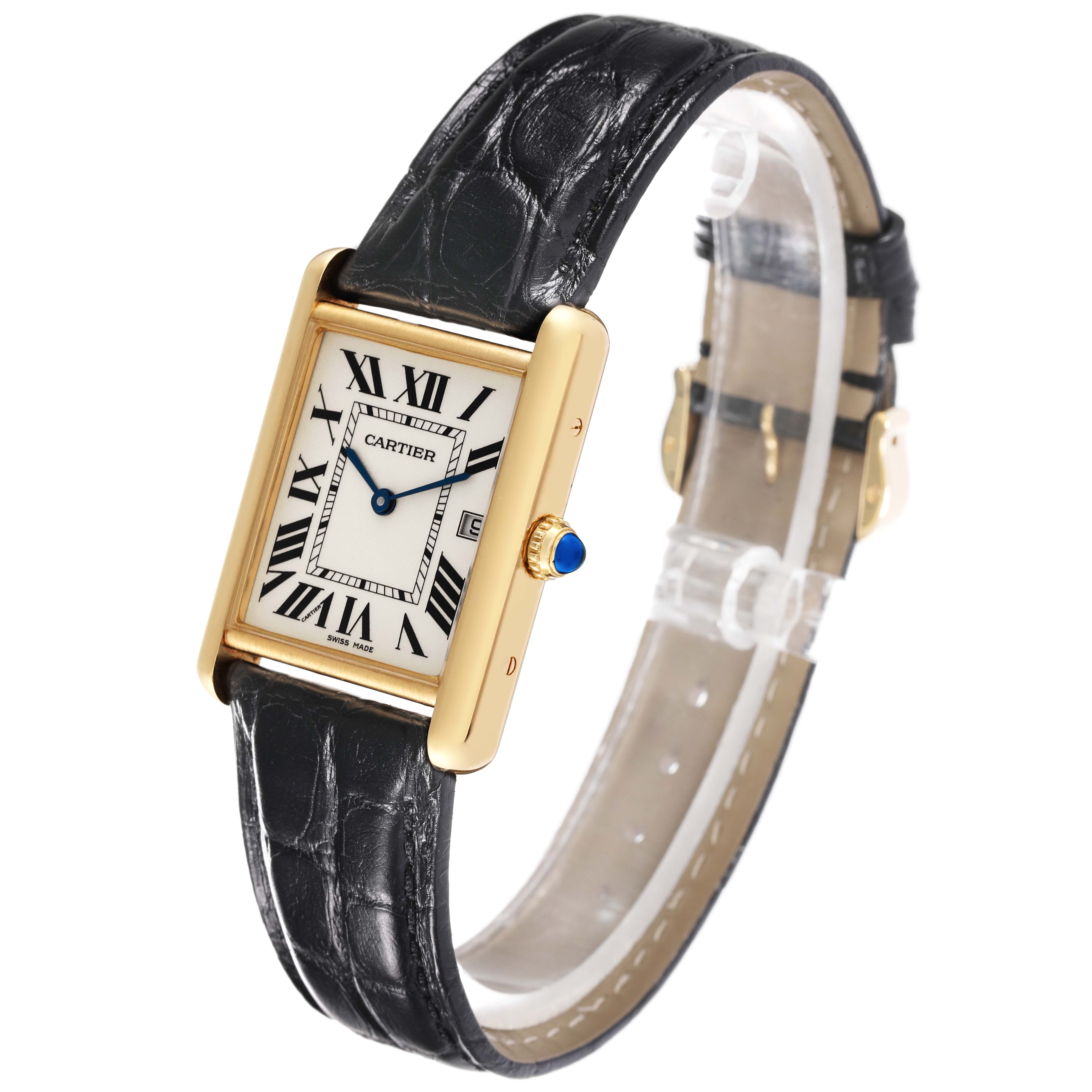 The Tank Louis model by Cartier is shown at an angled view, displaying the face, gold case, crown, and black leather strap.