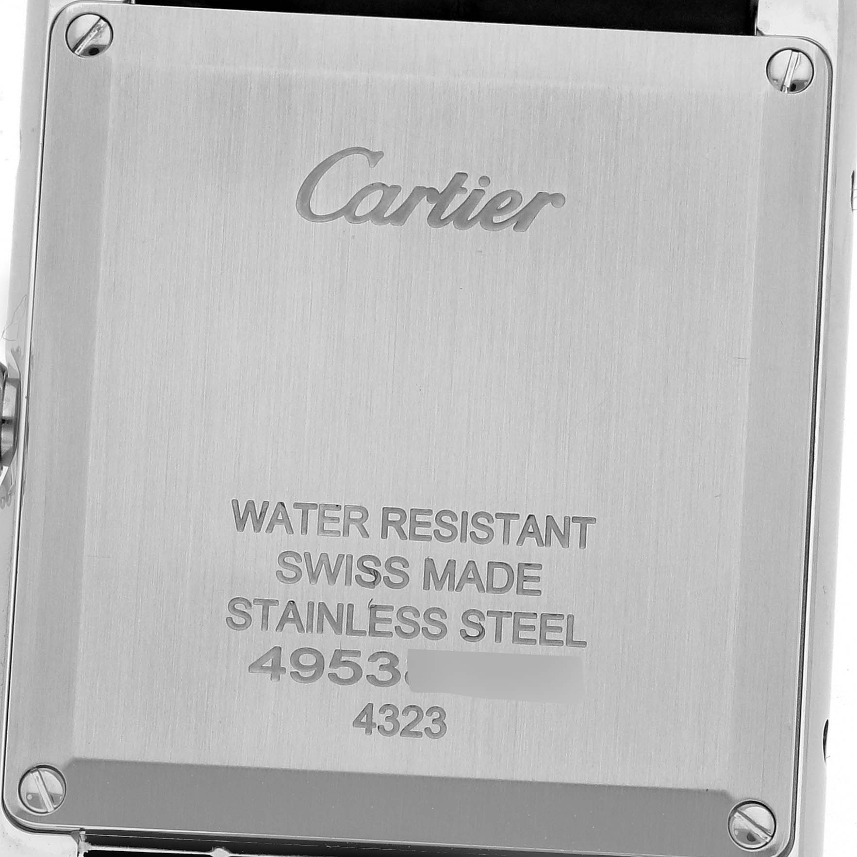 This is the back view of a Cartier Tank Must WSTA0056 Women's Stainless Steel Green Dial WSTA0056 Women's Stainless Steel Green Dial watch showing its stainless steel case and engraved details.