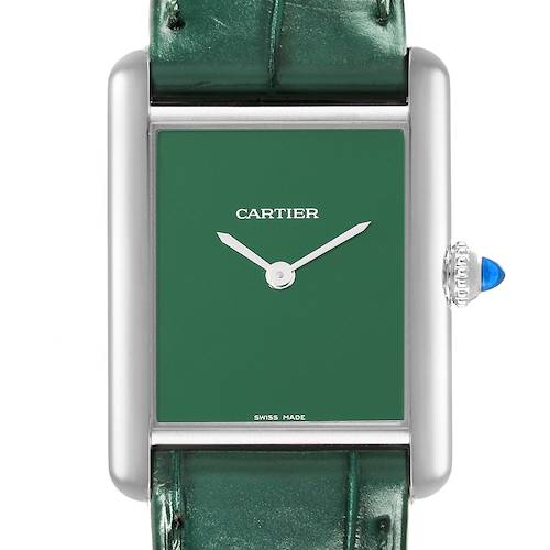 The image shows a close-up of the face and crown of a Cartier Tank Must watch.