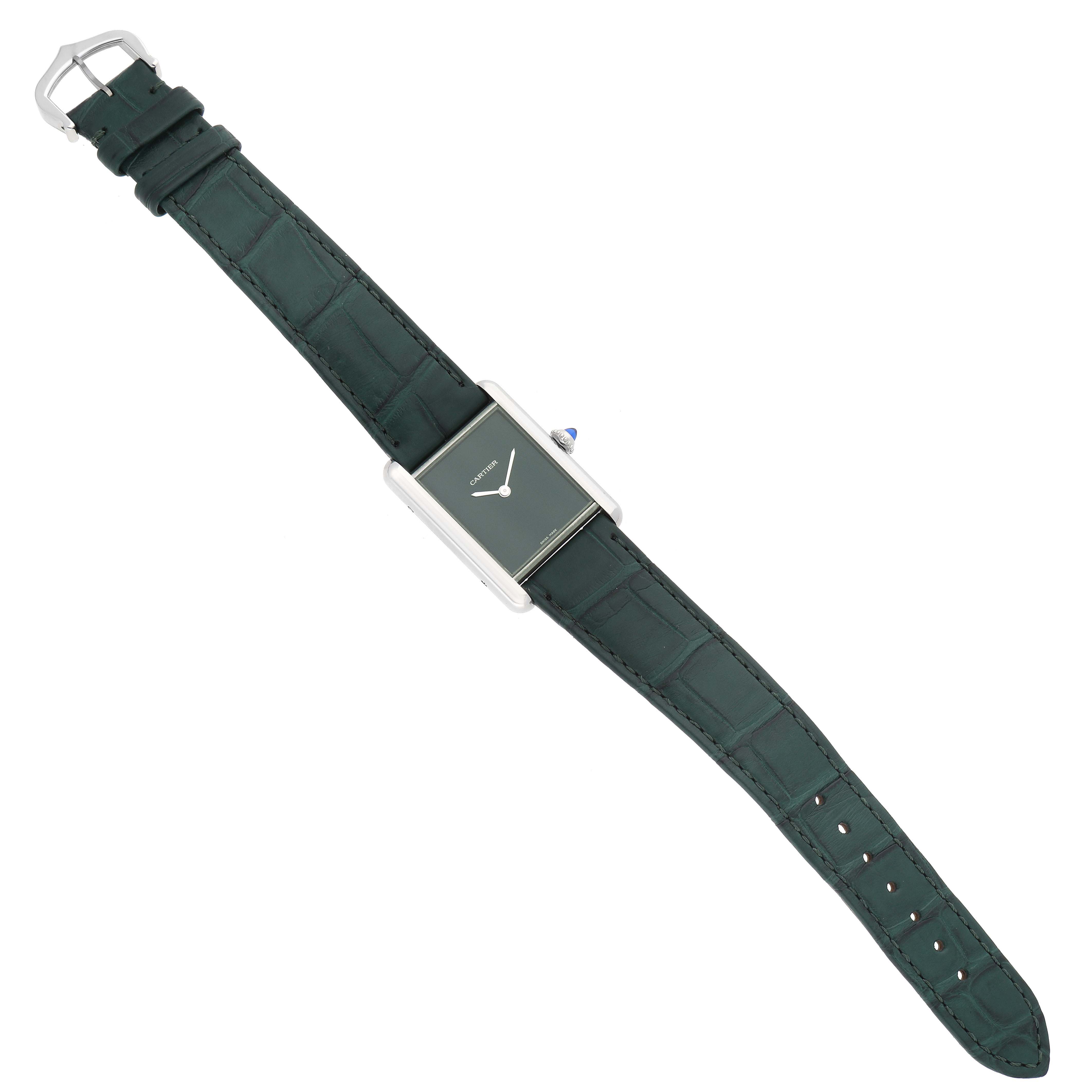 The watch is a Cartier Tank Must WSTA0056 Women's Stainless Steel Green Dial WSTA0056 Women's Stainless Steel Green Dial model shown from the top view, displaying its face, strap, and buckle.