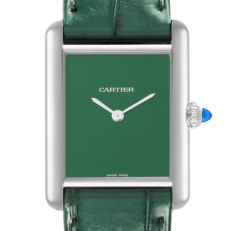 The Tank Must watch by Cartier is shown from a front angle, showcasing its green dial, rectangular case, and green leather strap.