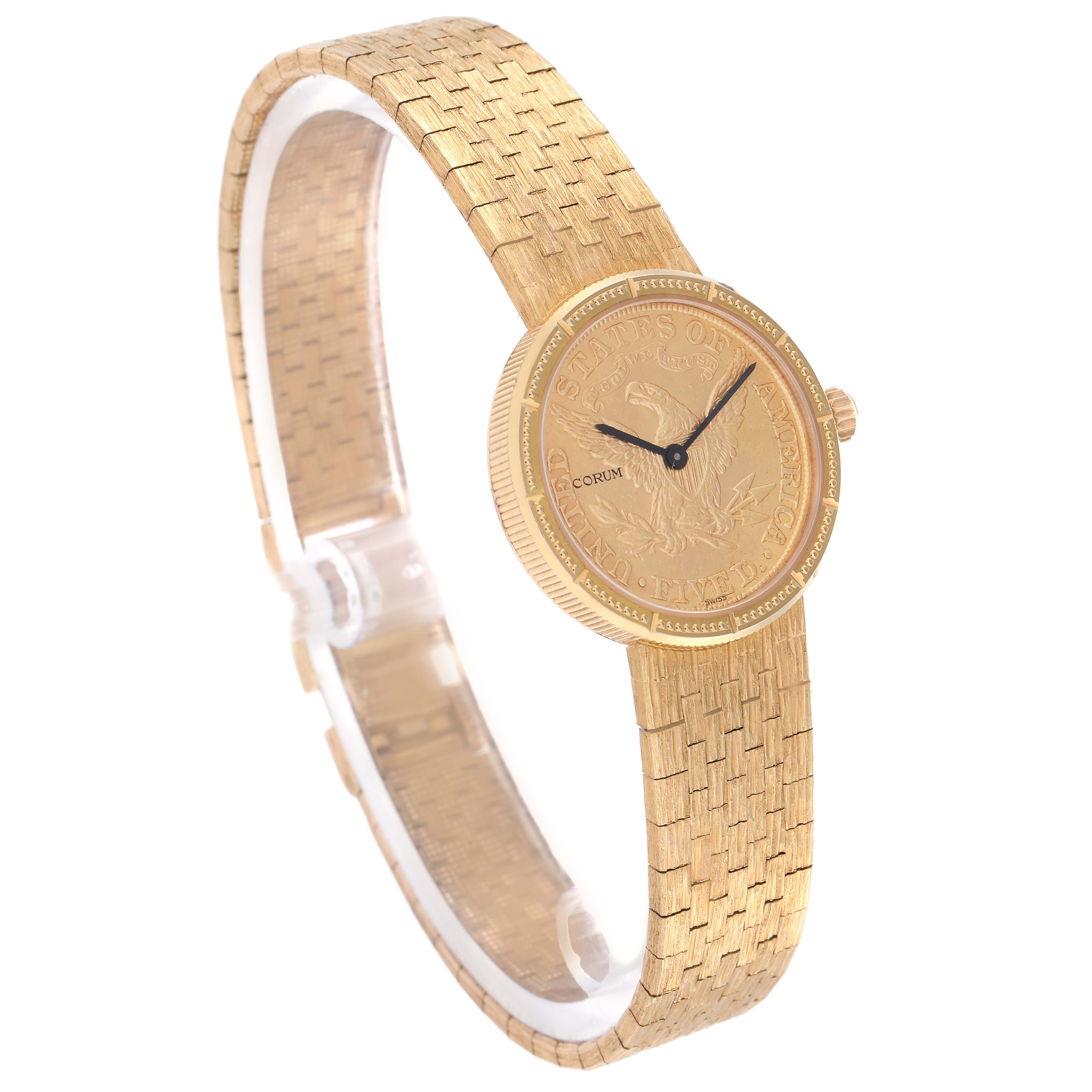 The Corum watch, model number 1892 YEAR, is angled to show the gold coin dial, woven gold bracelet, and side profile, highlighting its intricate details.