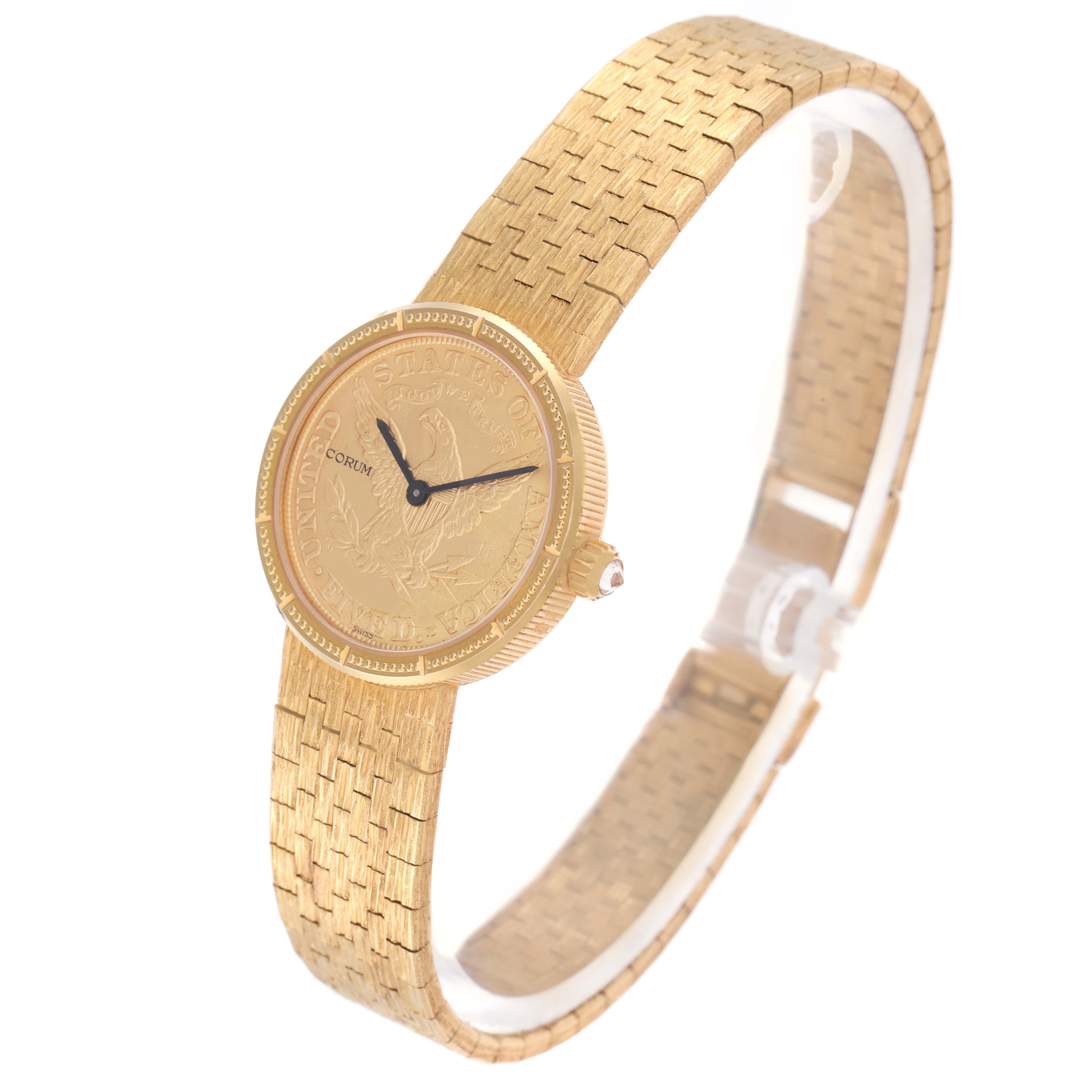 The Corum watch model 1892 YEAR is shown from a side angle, highlighting the intricate gold dial, case, and textured bracelet.