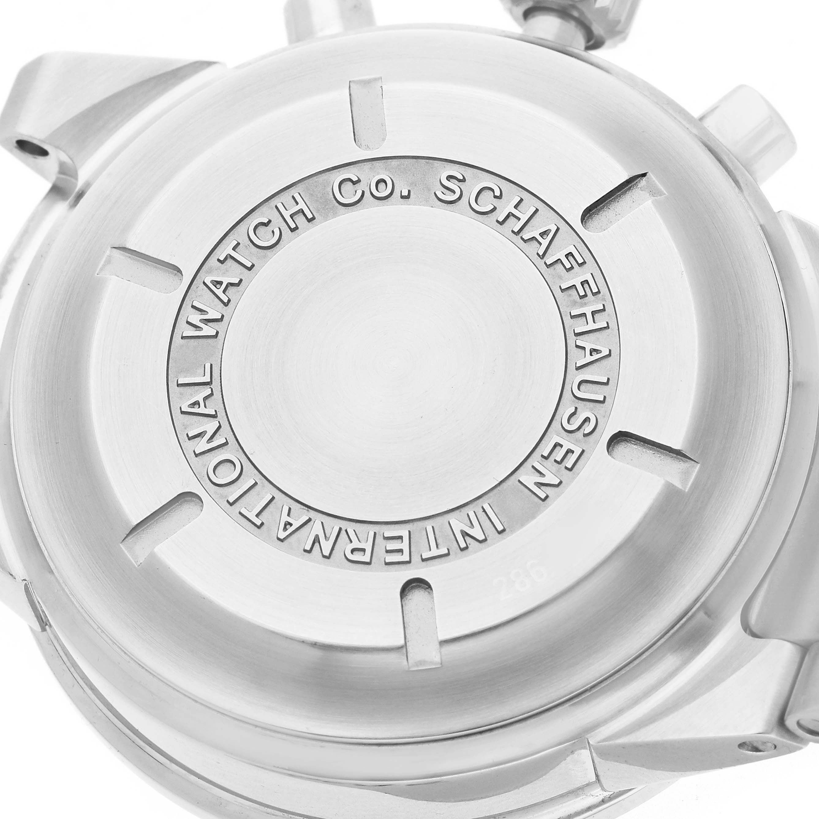 The image shows the back casing of the IWC GST model watch, model number IW370713, displaying the engraved brand name and detailing.