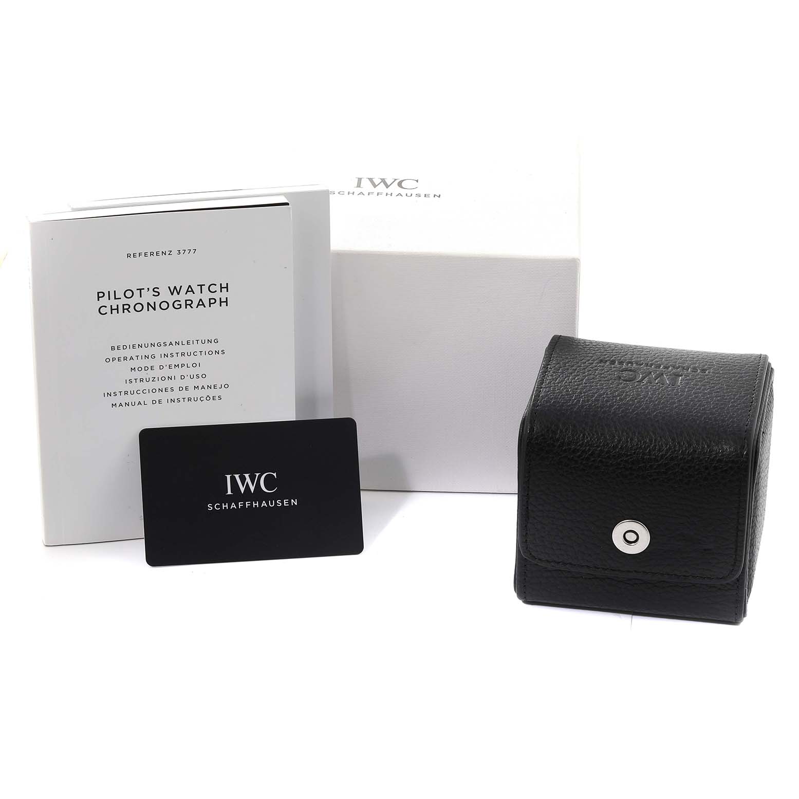 The image shows the packaging, instruction manual, warranty card, and a black leather case for the IWC Pilot IW377726 Men's Stainless Steel Green Dial IW377726 Men's Stainless Steel Green Dial's Watch Chronograph.