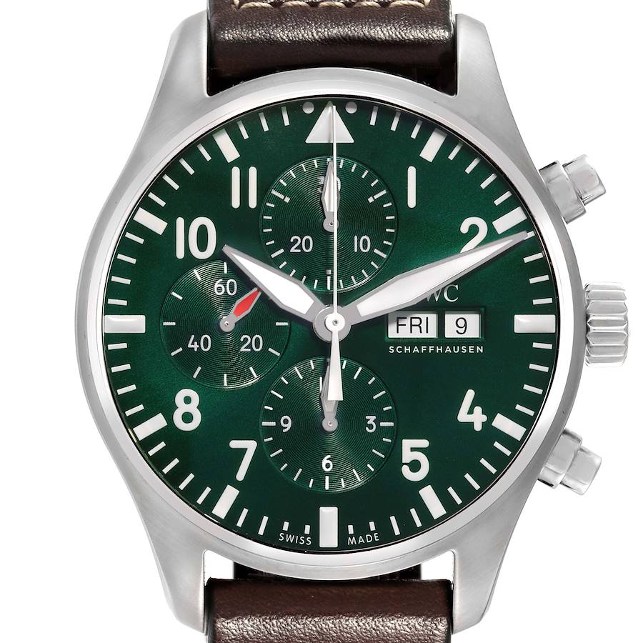 The image shows the face of an IWC Pilot model watch, displaying hour markers, hands, sub-dials, and the crown.