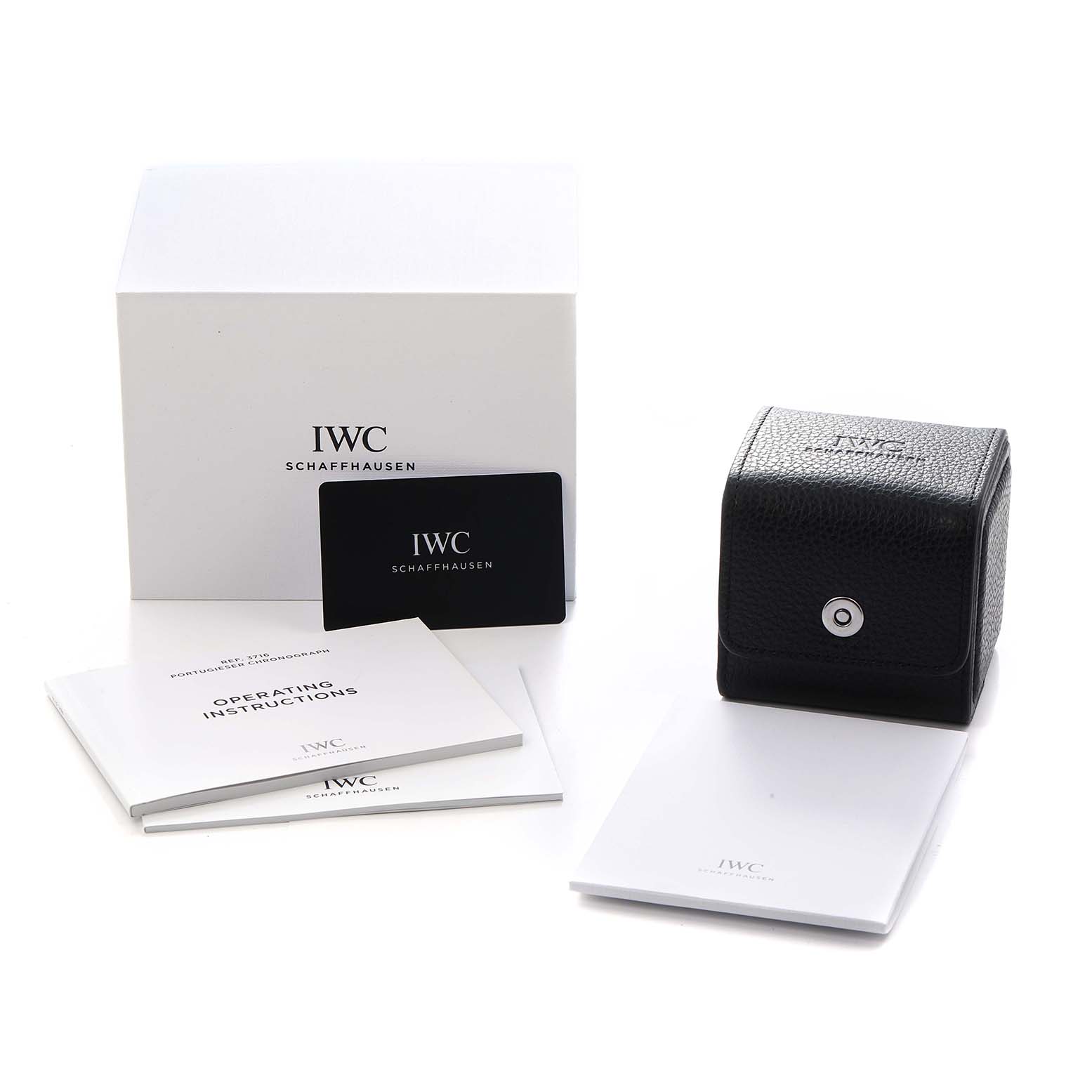 The image shows accessories for the IWC Pilot model IW329702, including a box, leather case, operating instructions, and warranty card.