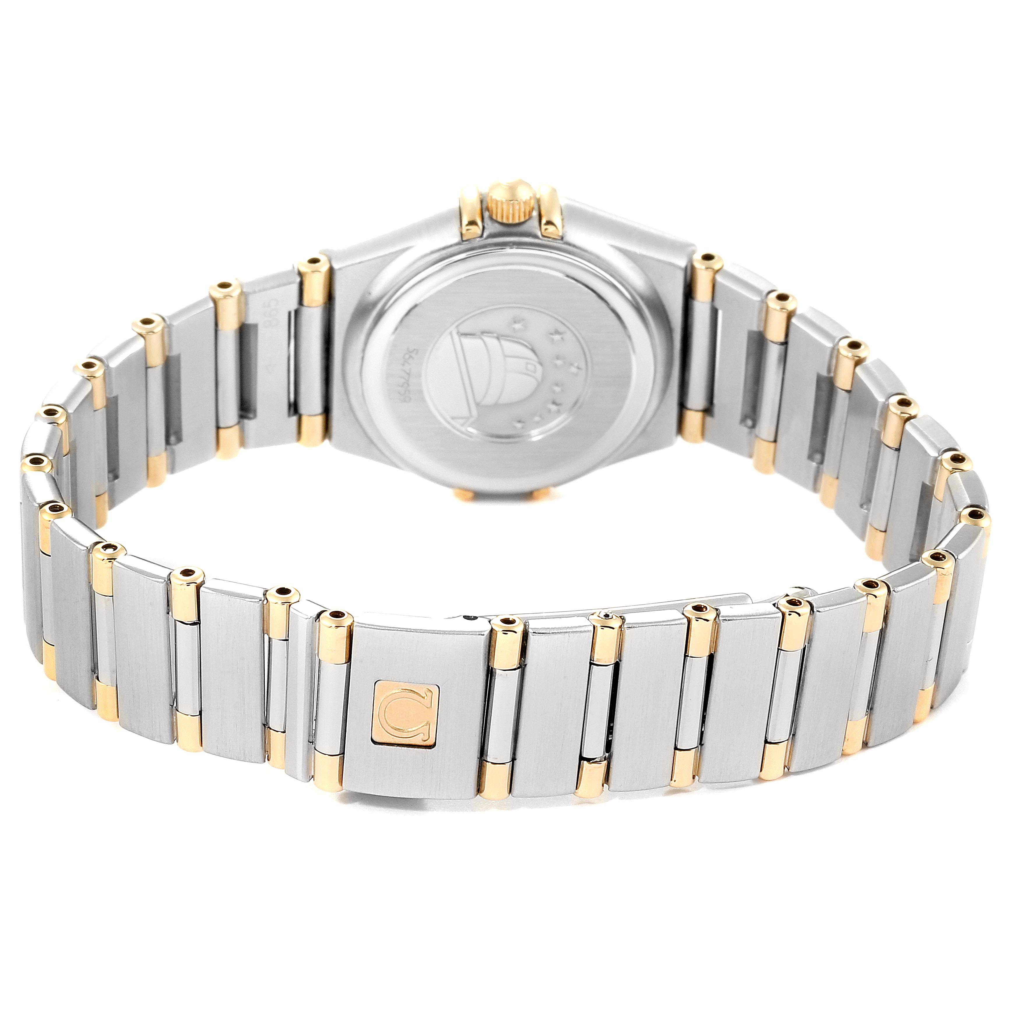 The image shows the back of the Omega 1267.75.00 Women's Steel and Gold (two tone) Mother of Pearl Dial 1267.75.00 Women's Steel and Gold (two tone) Mother of Pearl Dial Constellation 95 Mother of Pearl Diamond Ladies Watch 1267.75.00 and its metal bracelet.
