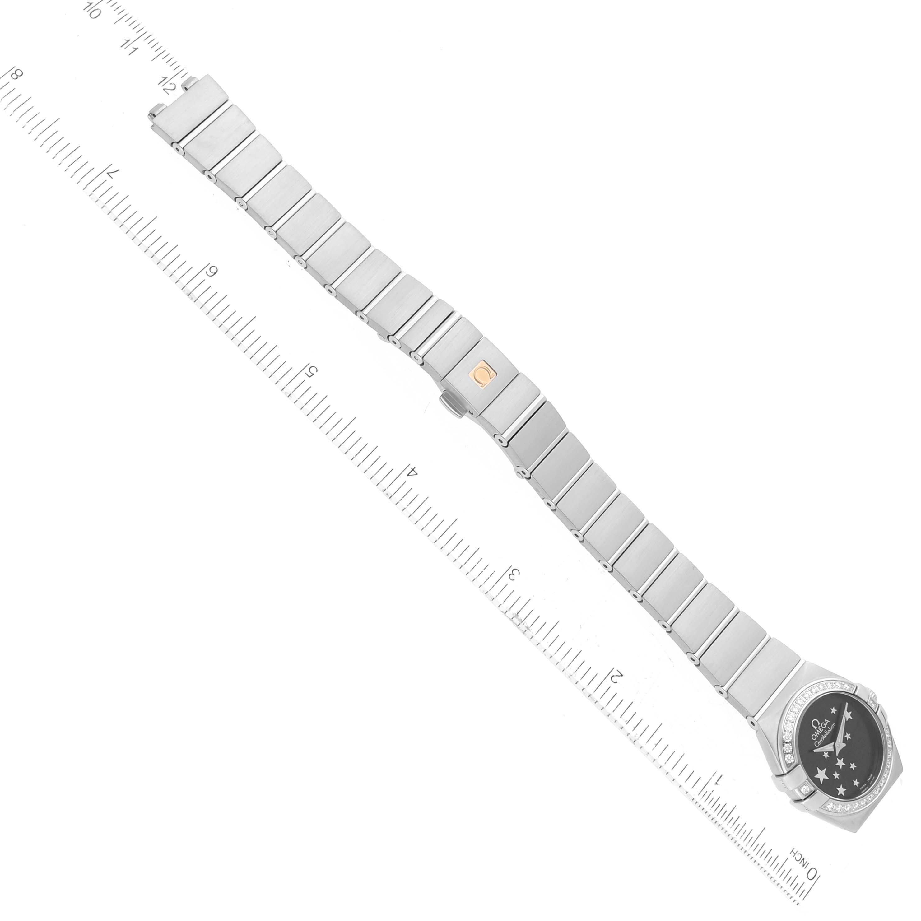 The Omega 123.15.24.60.01.001 Women's Stainless Steel Black Dial 123.15.24.60.01.001 Women's Stainless Steel Black Dial Constellation Orbis Star Steel Diamond Watch (model 123.15.24.60.01.001) is shown flat with a ruler for scale.