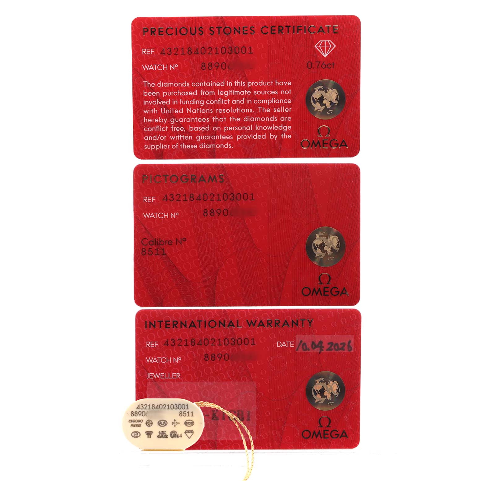 The image shows three red Omega cards for the De Ville model, including a Precious Stones Certificate, Pictograms, and International Warranty.