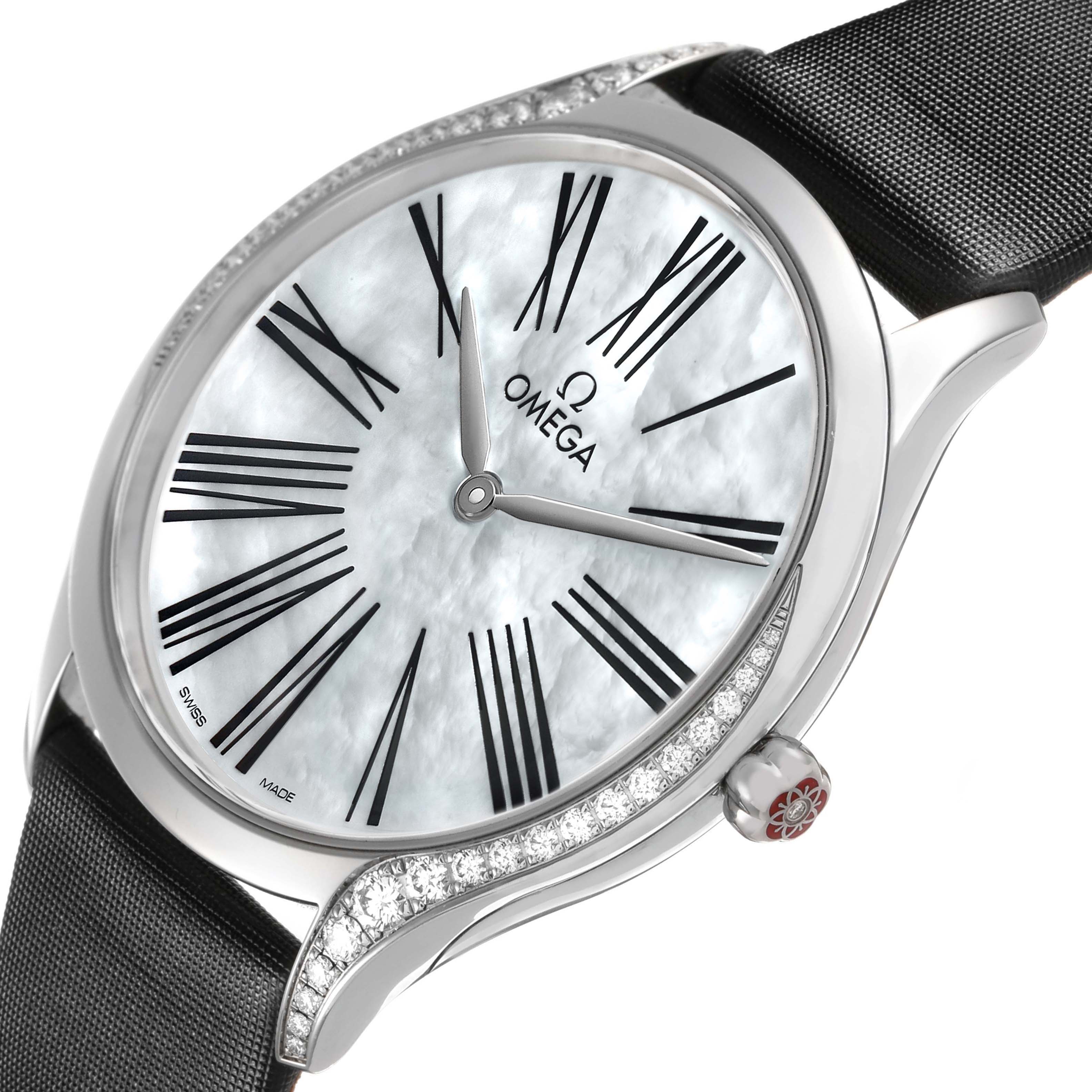 The Omega 428.17.36.60.05.001 Women's Stainless Steel Mother of Pearl Dial De Ville Tresor shows a close-up of its dial, diamond-accented bezel, and a portion of the black strap.