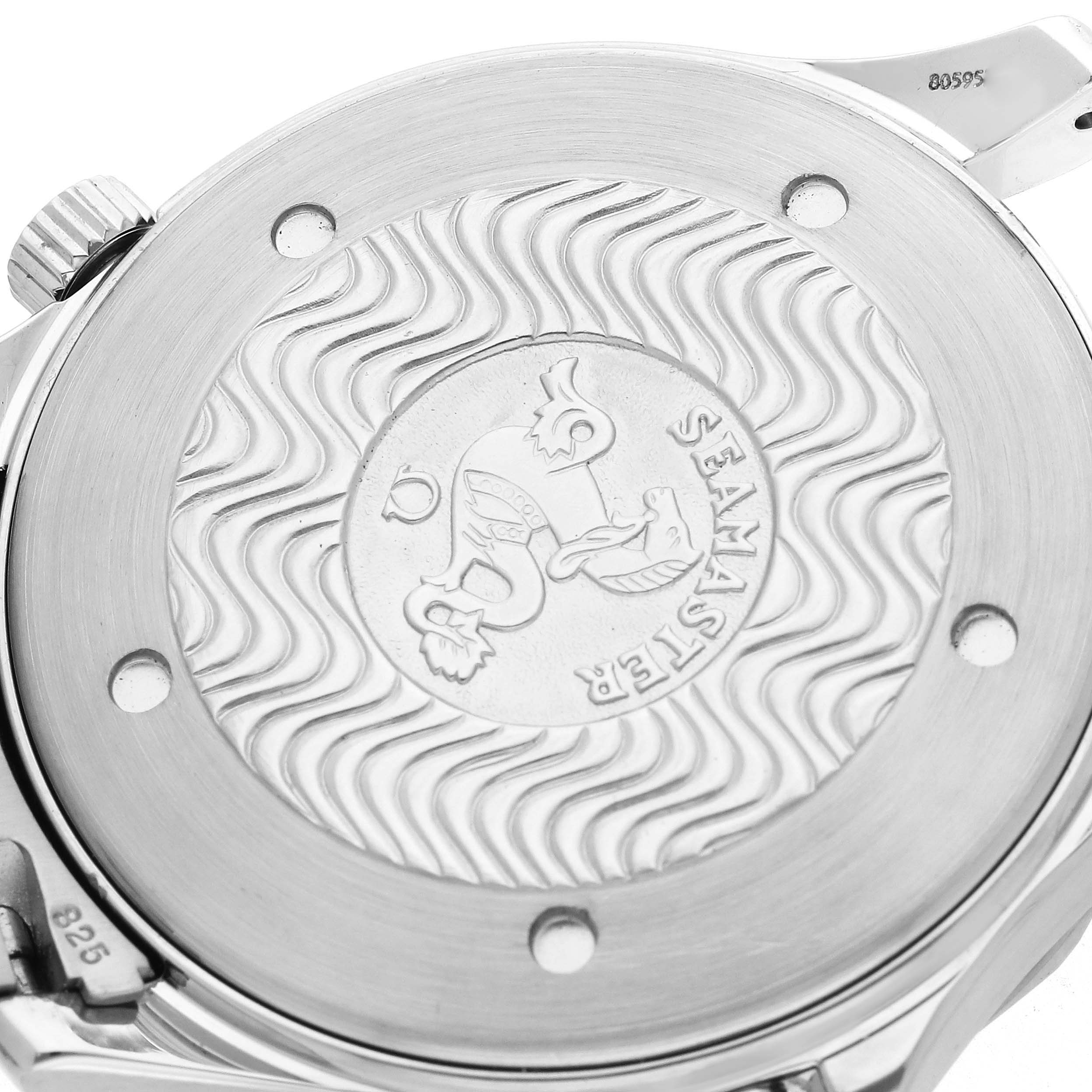 The image shows the back case of an Omega Seamaster 2531.80.00 Men
s Stainless Steel Blue Dial watch, featuring an engraved design and partial view of the crown.