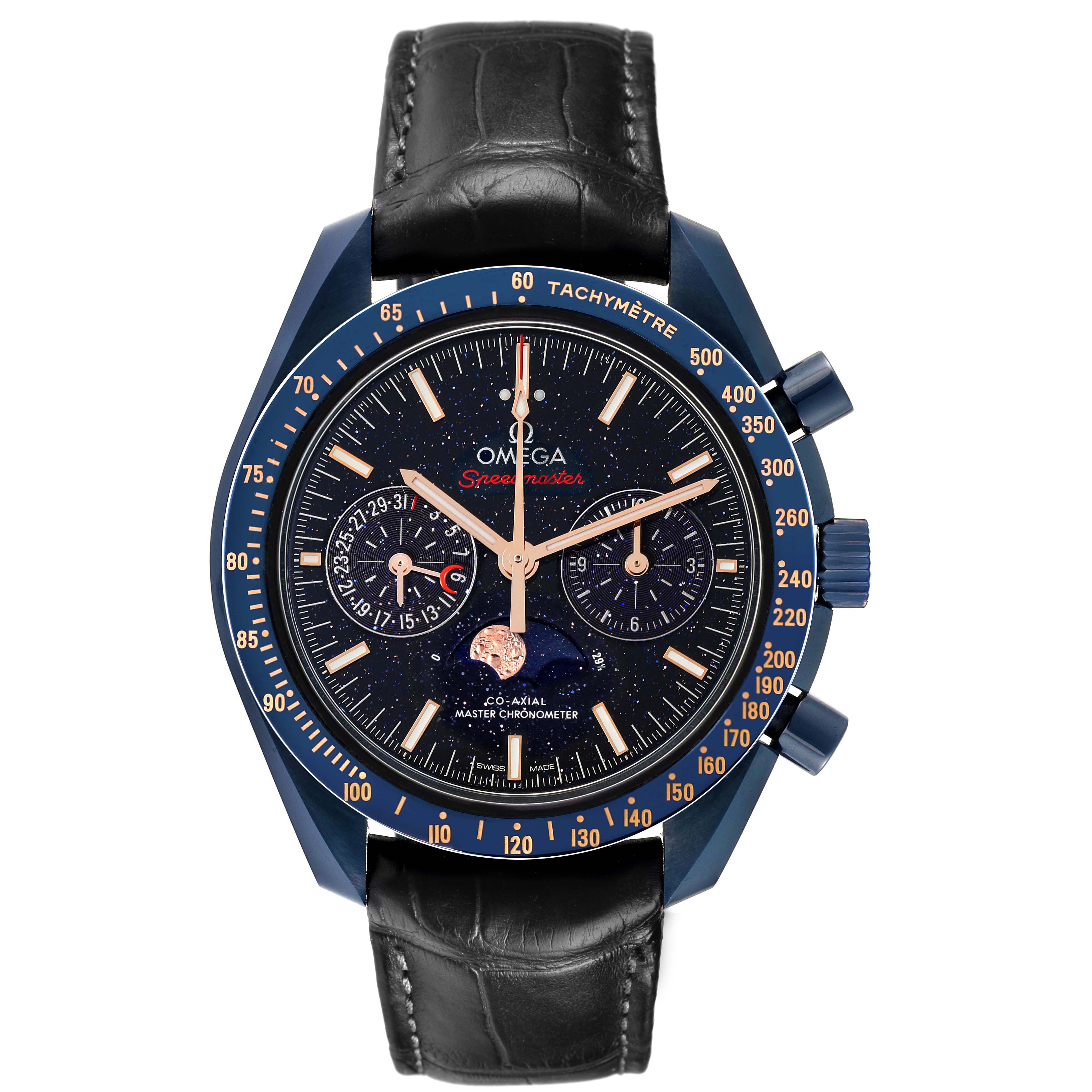 The Omega Speedmaster 304.93.44.52.03.002 Men's Ceramic Blue Dial model is shown from the front, highlighting the face and bezel with detailed subdials and a black leather strap.