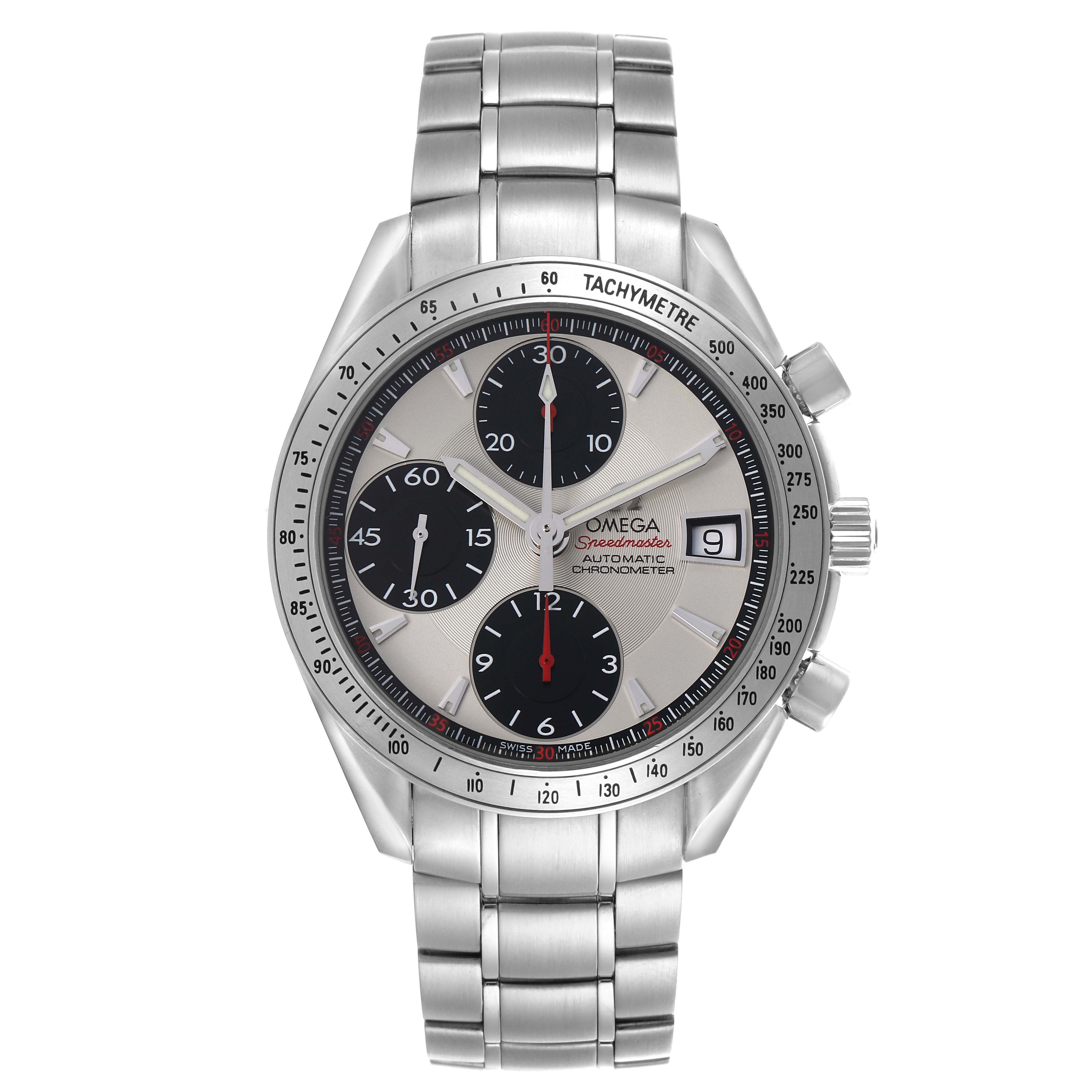 The Omega Speedmaster 3211.31.00 watch is shown from a top angle, displaying the face, bezel, subdials, date window, and stainless steel bracelet clearly.