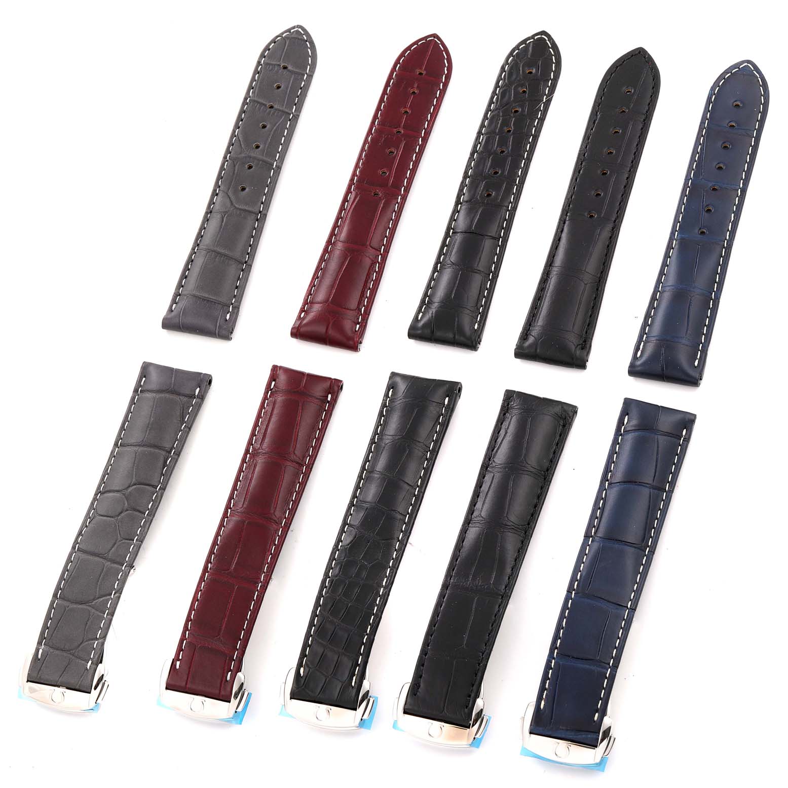 This image shows a top-down view of multiple leather watch straps for the Omega Speedmaster 522.20.42.30.01.001 Men's Stainless Steel Black Dial 522.20.42.30.01.001 Men's Stainless Steel Black Dial model in various colors.