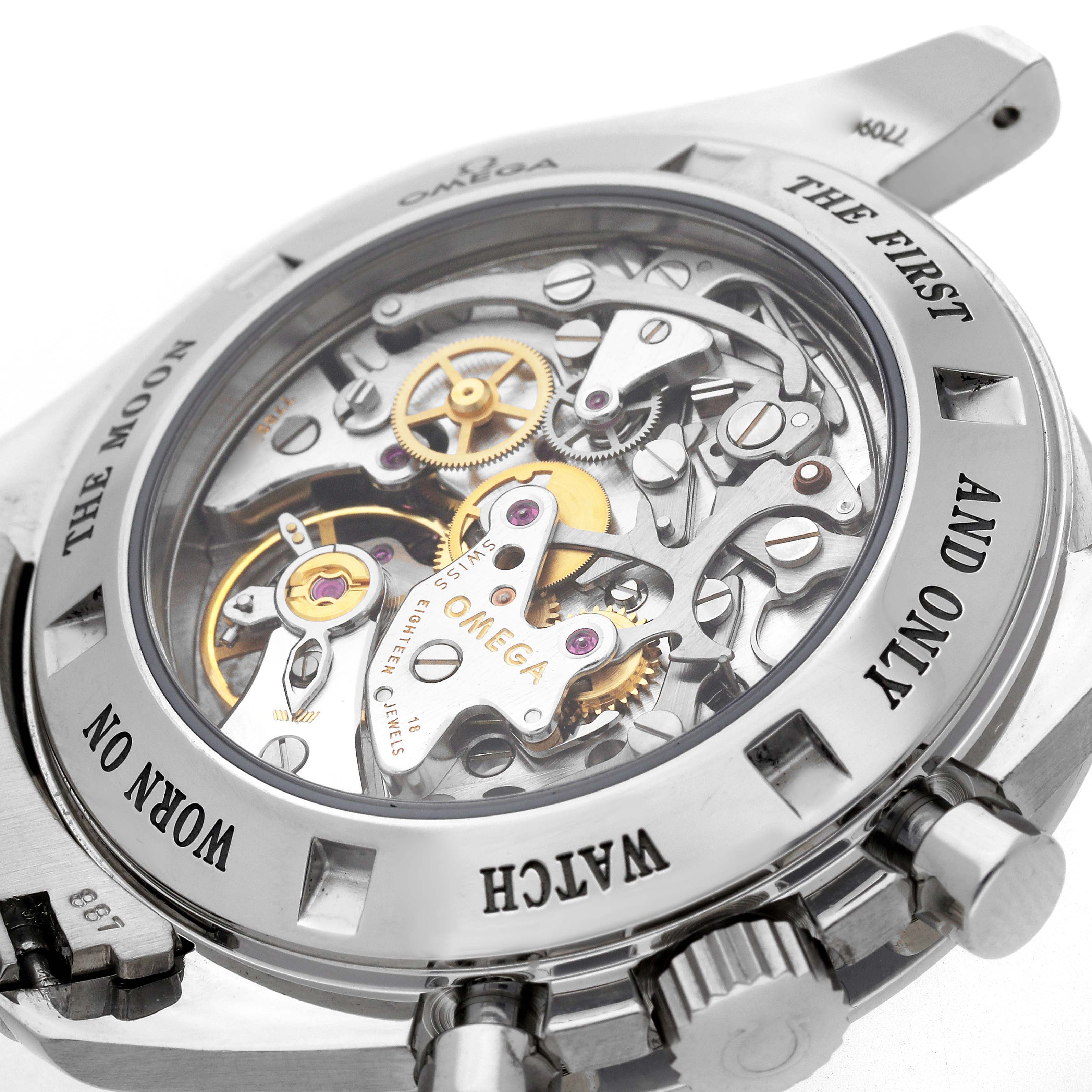 The image shows the back of the Omega Speedmaster 3876.50 Men
s Stainless Steel Black Dial, highlighting the intricate mechanical movement and engraved case details.