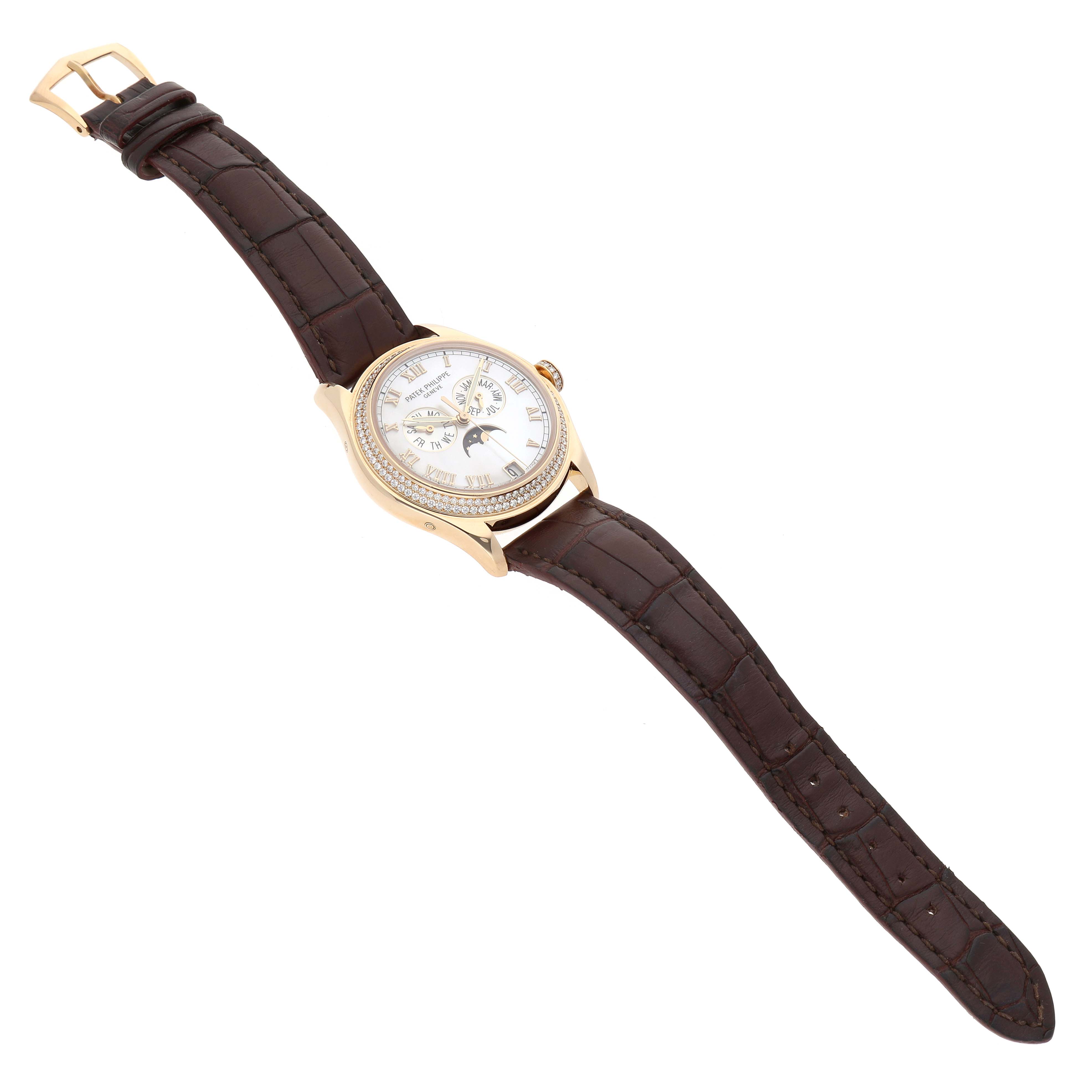 The Patek Philippe Complications 4936J-001 Men's Yellow Gold Mother of Pearl Dial model is shown from a top-side angle, displaying the dial, bezel, and brown leather strap.