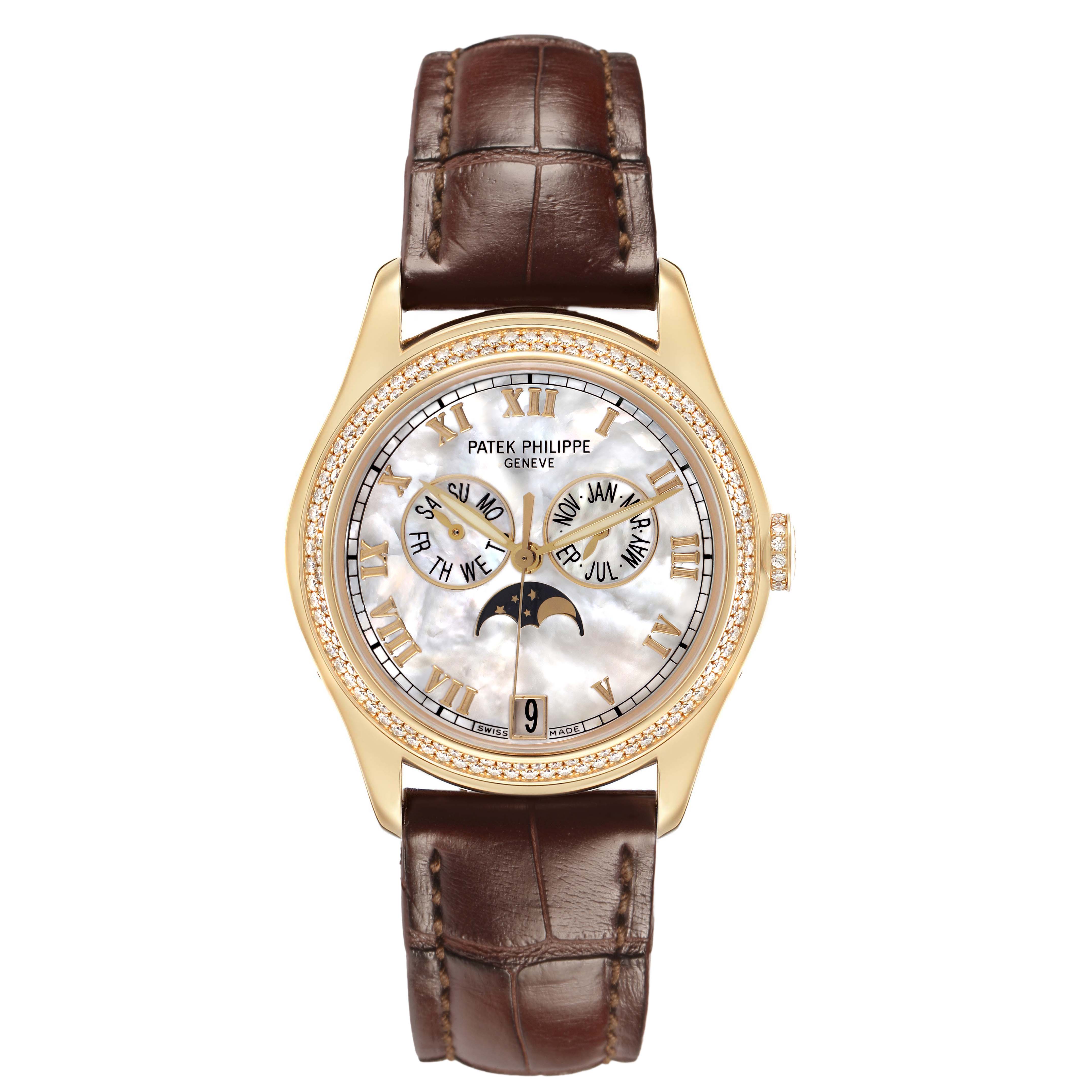 The Patek Philippe Complications 4936J-001 Men's Yellow Gold Mother of Pearl Dial watch is shown from a top-down angle, displaying its face, gold case, and brown leather strap.