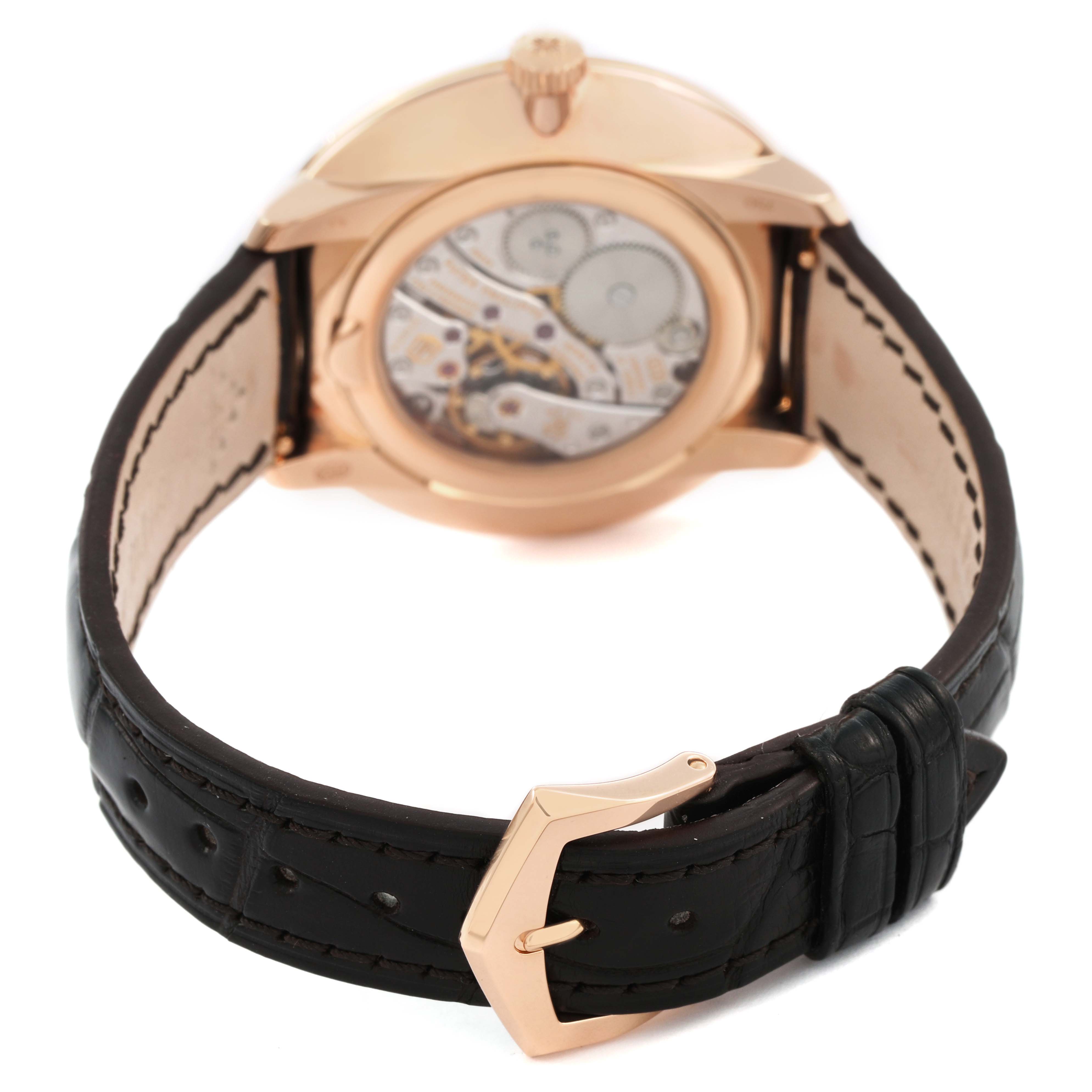 The Patek Philippe Calatrava 5123R-001 Men's Rose Gold Silver Dial watch is shown from the back, displaying the movement through the case back and part of the leather strap.