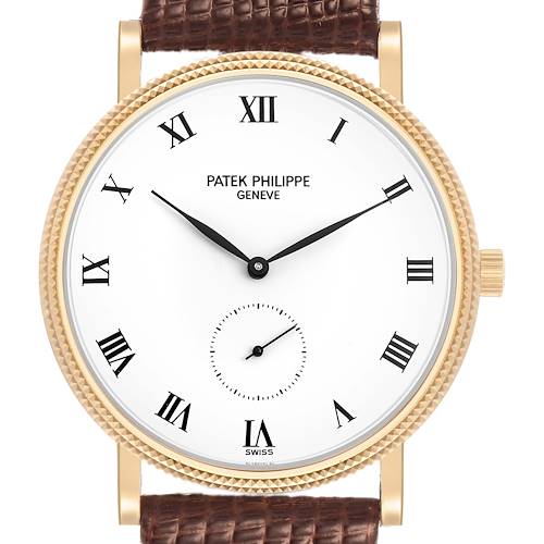 The image shows a Patek Philippe Calatrava 3919J Men's Yellow Gold White Dial watch face, crown, and a part of the leather strap from a front angle.