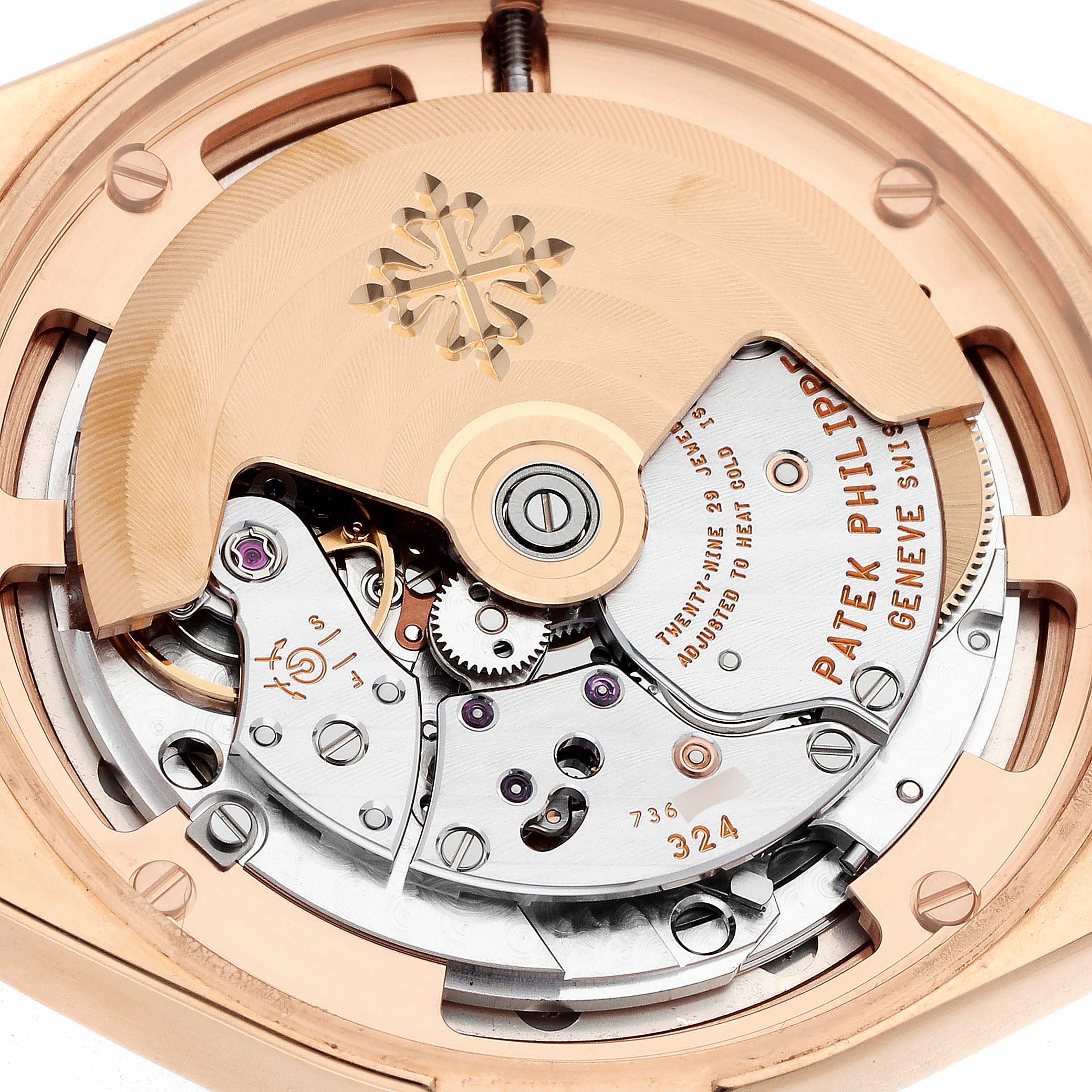 The image shows the intricate movement mechanism of a Patek Philippe Twenty-4 7300/1200R-010 Women's Rose Gold Silver Dial watch from a top-down angle.
