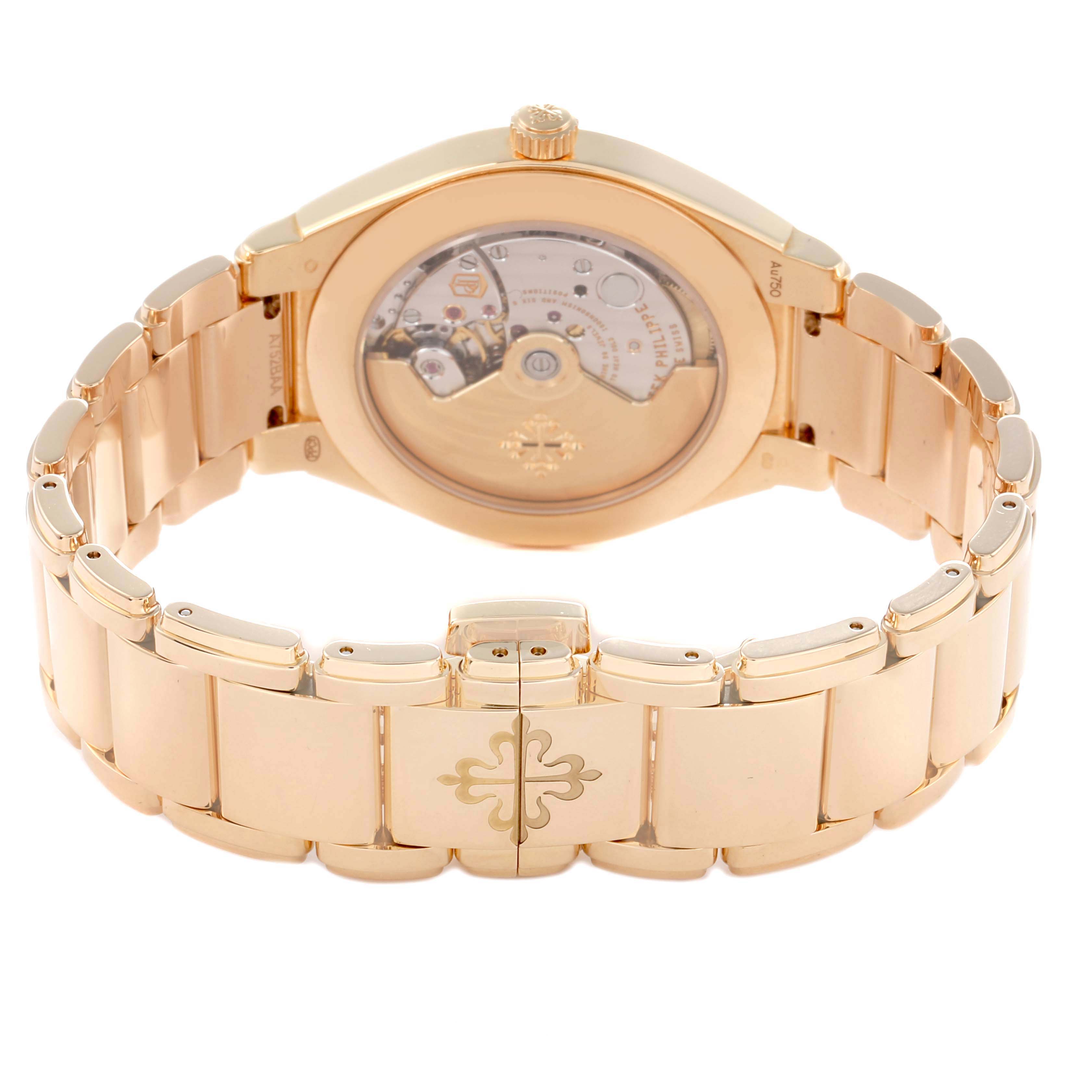 The image shows the back of the Patek Philippe Twenty-4 7300/1200R-010 Women's Rose Gold Silver Dial watch, highlighting the movement and bracelet.