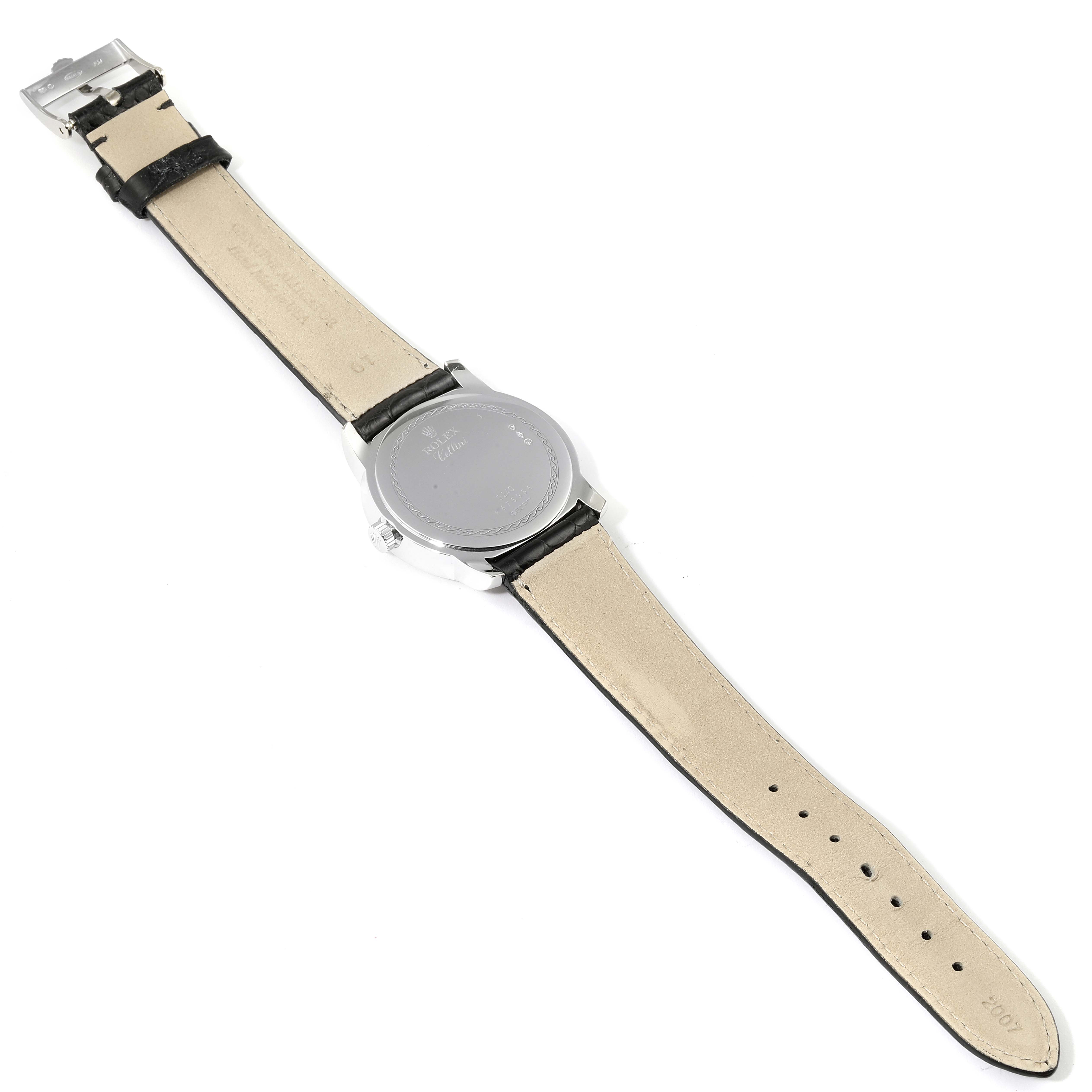 The image shows the back of a Rolex Cellini 5240 Men's Platinum Mother of Pearl Dial 5240 Men's Platinum Mother of Pearl Dial watch with its black leather strap fully extended.