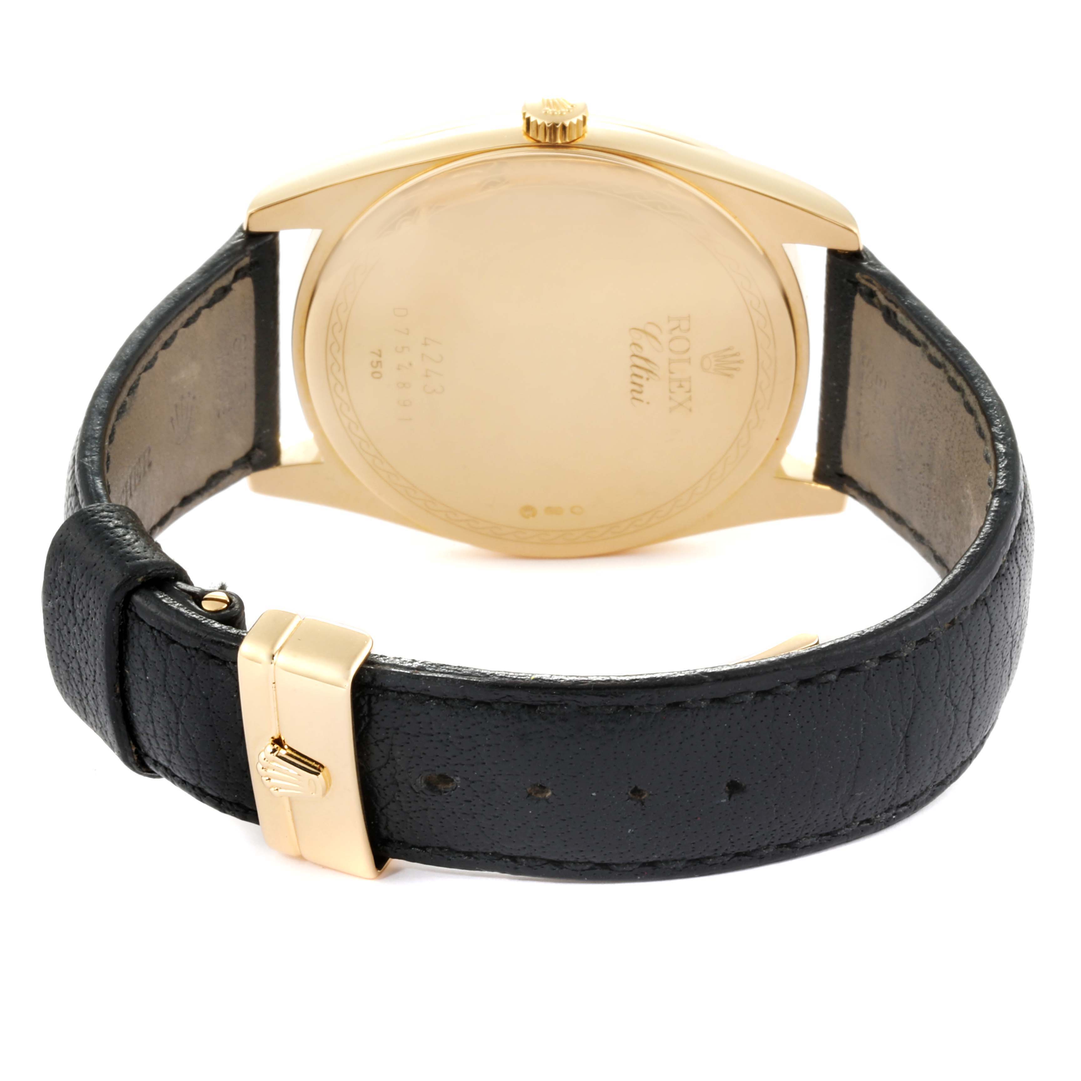 The image shows the back case and leather strap of a Rolex Cellini 4243 Men's Yellow Gold White Dial 4243 Men's Yellow Gold White Dial watch from a rear angle.
