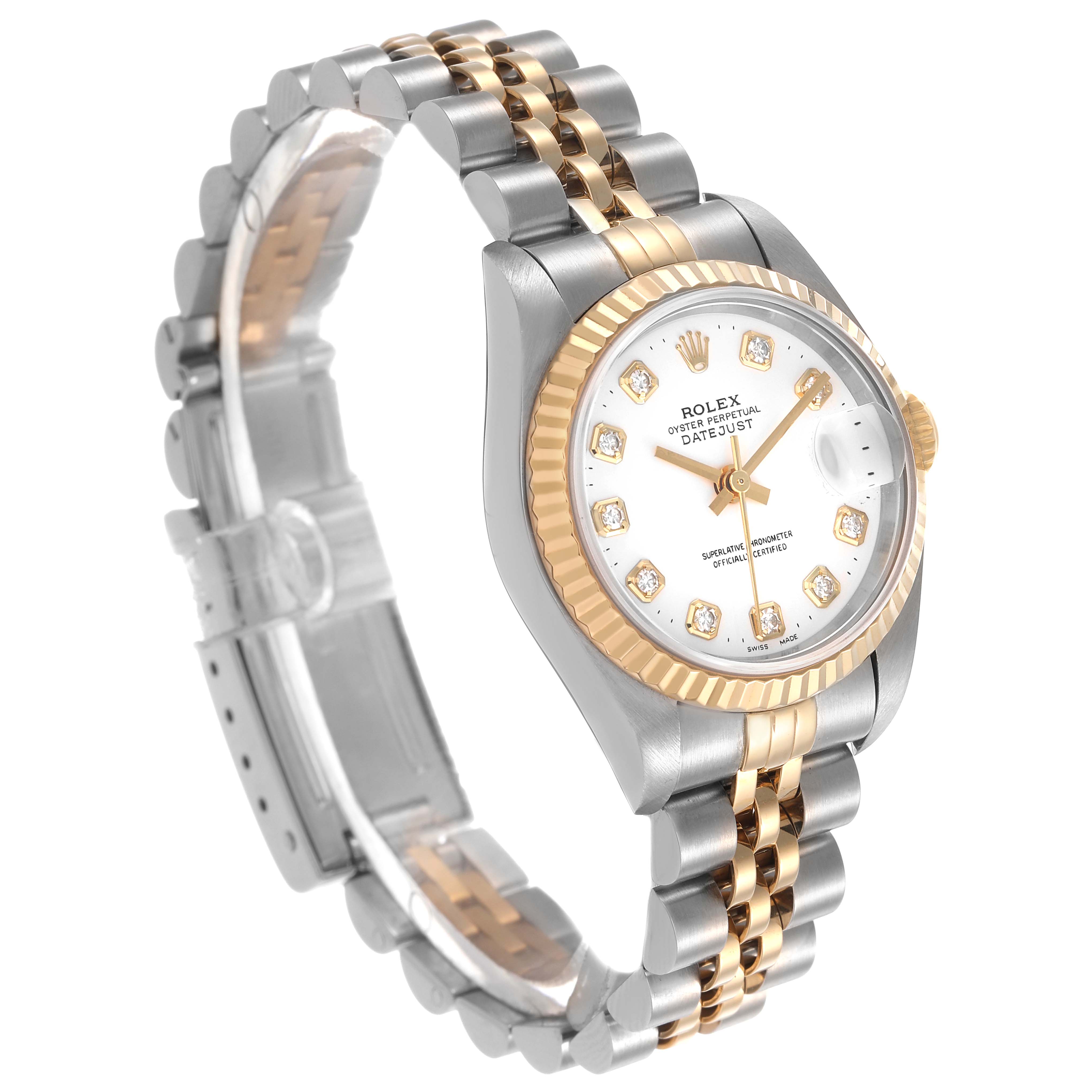 The Rolex Datejust 79173 Women's Stainless Steel White Dial watch is shown at an angled view, displaying the dial, fluted bezel, and two-tone bracelet.