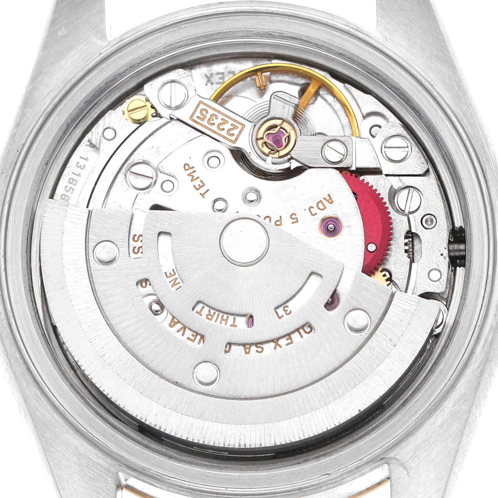 The image shows a Rolex Datejust 79173 Women's Stainless Steel White Dial watch movement from the back, highlighting the rotor and engraved details.