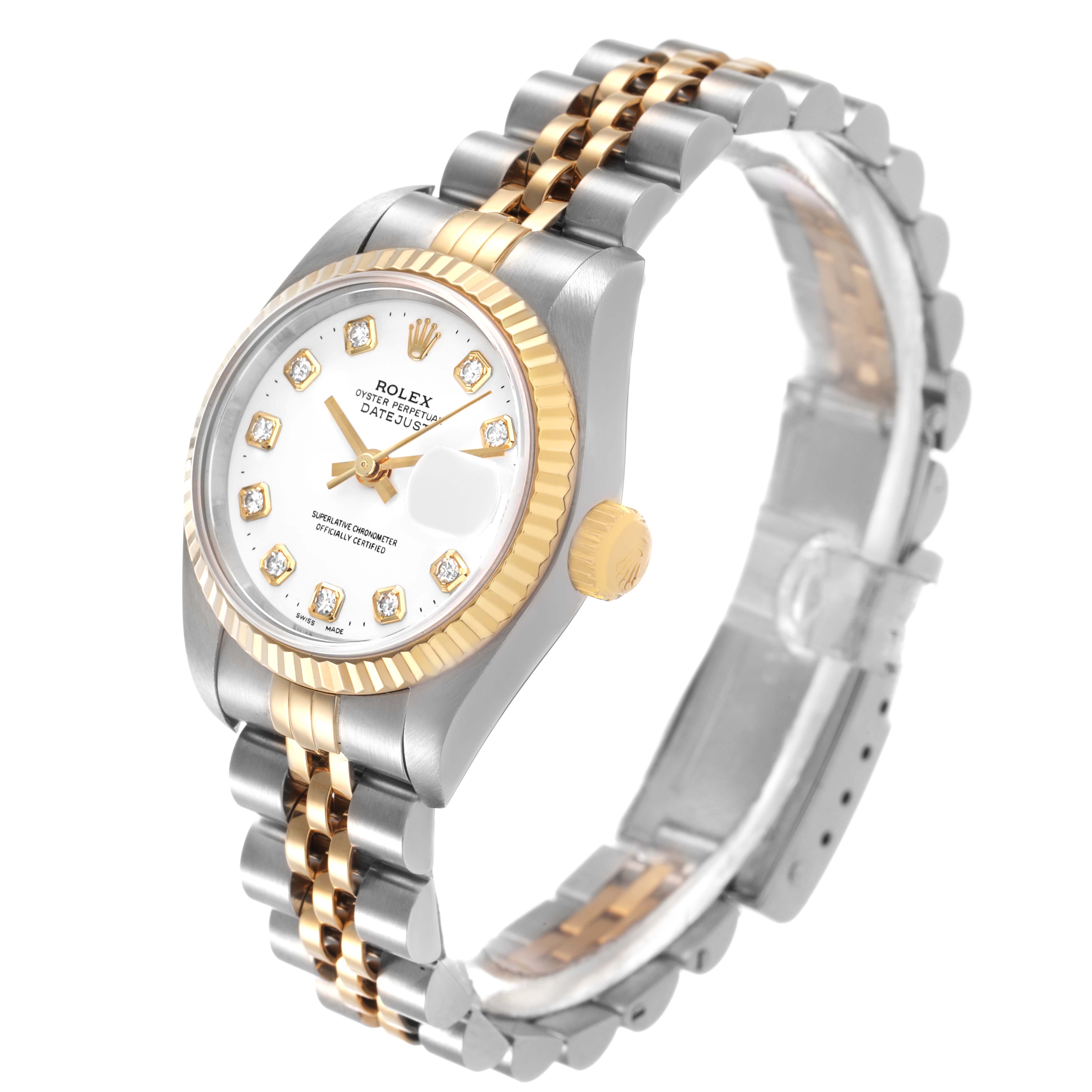 The Rolex Datejust 79173 Women's Stainless Steel White Dial watch is shown at an angled side view, highlighting the dial, fluted bezel, two-tone bracelet, and crown.