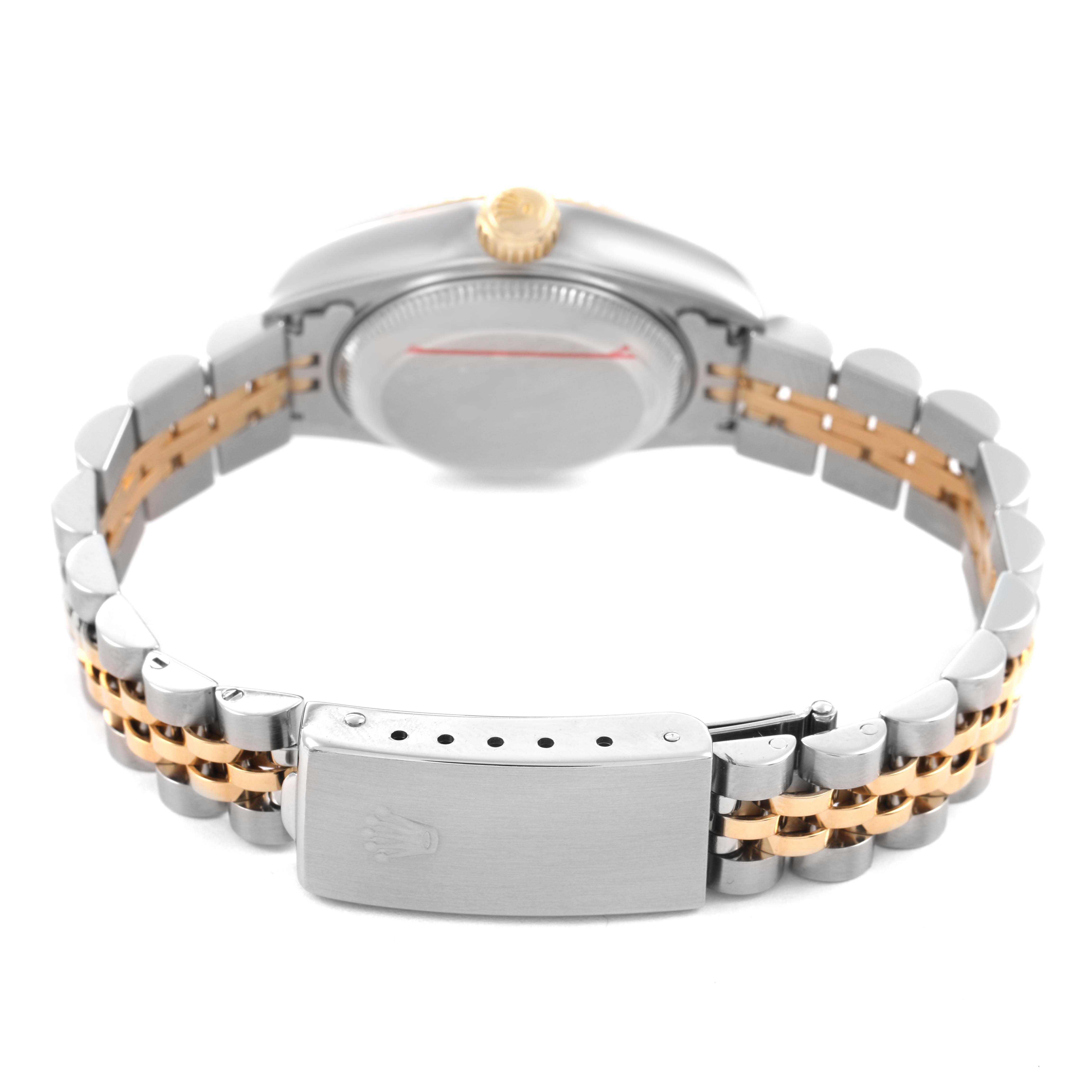 The image shows the back side of a Rolex Datejust 79173 Women's Stainless Steel White Dial watch, highlighting the clasp, bracelet, and case back.
