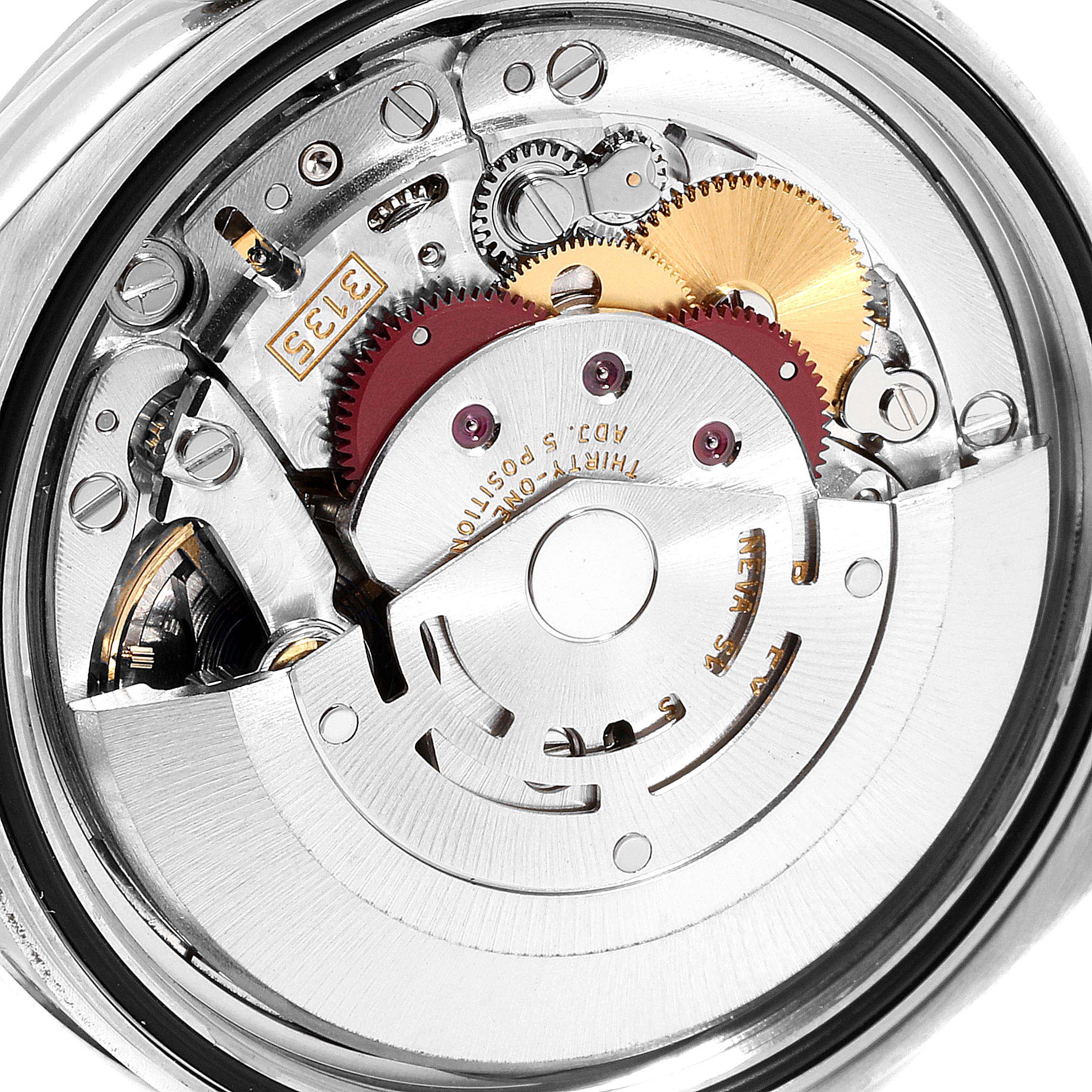 This image shows the internal mechanism of a Rolex Datejust 116244 Men's Stainless Steel Black Dial 116244 Men's Stainless Steel Black Dial watch, including gears and other intricate parts.