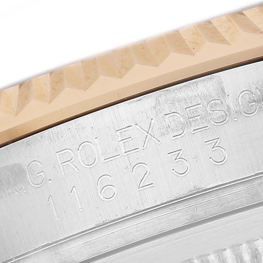 The image shows a close-up of the bezel and engraved model number of a Rolex Datejust 116233 Men's Stainless Steel Silver Dial watch.