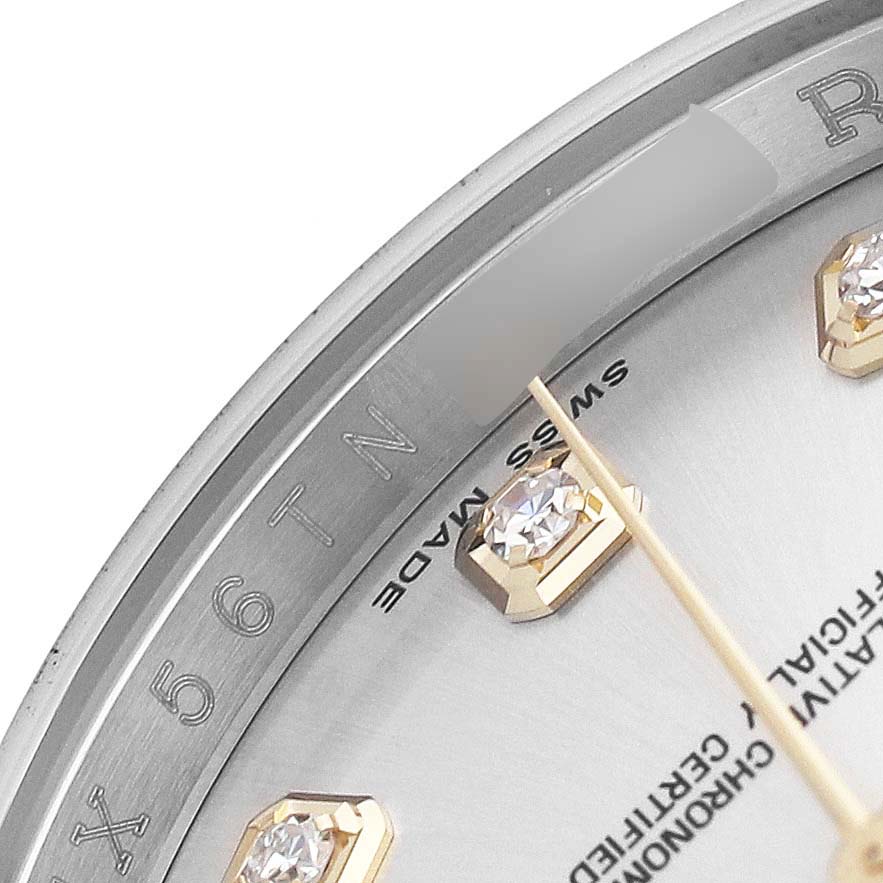 The image shows a close-up of the Rolex Datejust 116233 Men's Stainless Steel Silver Dial watch face, highlighting its diamond hour markers and partial bezel.
