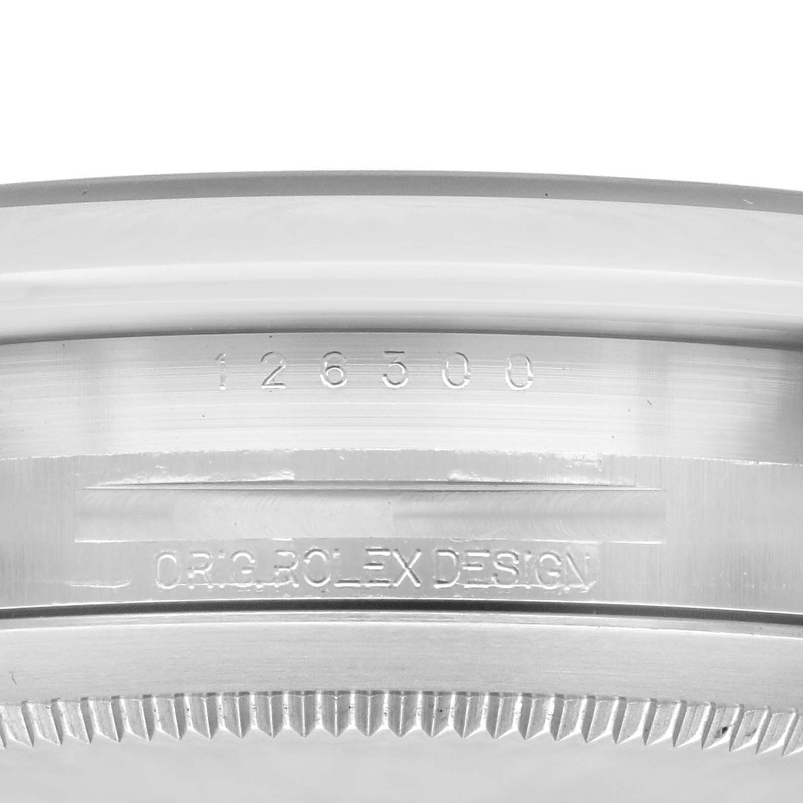 This image shows a close-up of the side engraving on the case of a Rolex Datejust 41 126300 Men
s Stainless Steel Silver Dial 126300 Men
s Stainless Steel Silver Dial model.