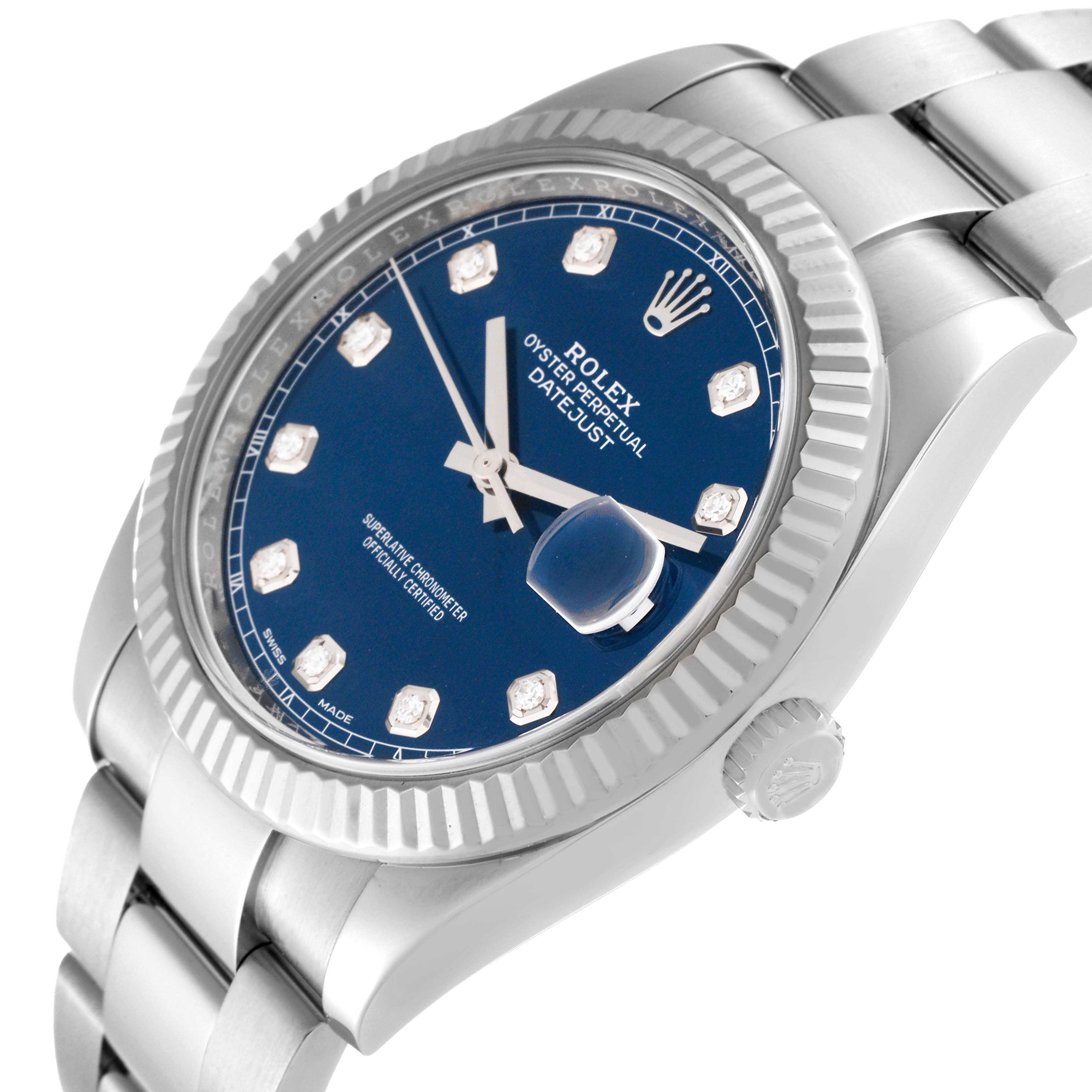 The image shows a close-up, angled view of the Rolex Datejust 41 126334 Men's Stainless Steel Blue Dial 126334 Men's Stainless Steel Blue Dial watch highlighting the blue dial, fluted bezel, and bracelet.