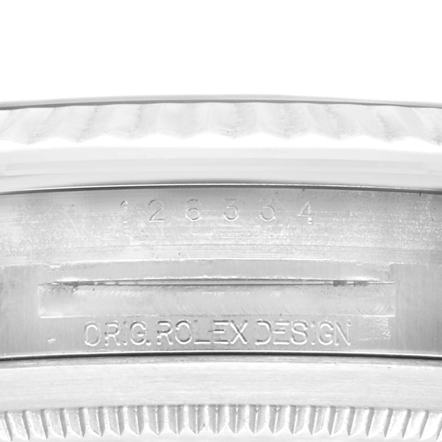 This close-up image of the Rolex Datejust 41 126334 Men's Stainless Steel Blue Dial 126334 Men's Stainless Steel Blue Dial shows the engraved reference number and "ORG. ROLEX DESIGN" text on the watch casing.