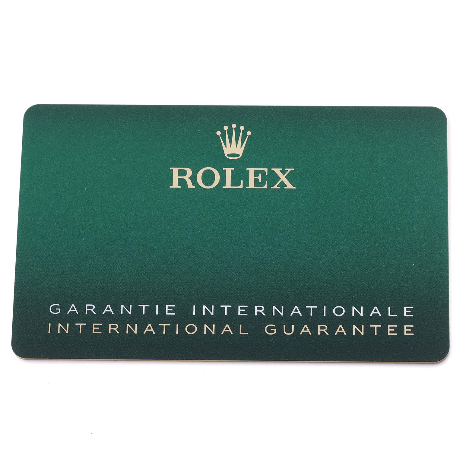 The image shows an international guarantee card for a Rolex Datejust 41, model number 126334NG, with a green background and gold lettering.