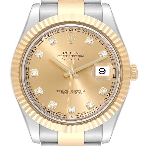 This image shows a close-up of the Rolex Datejust 41 watch face, highlighting its gold dial and fluted bezel.