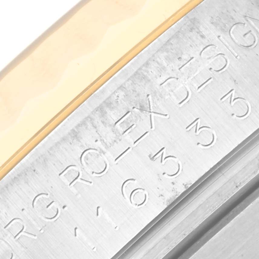 The image shows a macro shot of the case side and part of the bezel on a Rolex Datejust 41 116333 Men's Steel and Gold (two tone) Champagne Dial 116333 Men's Steel and Gold (two tone) Champagne Dial model.