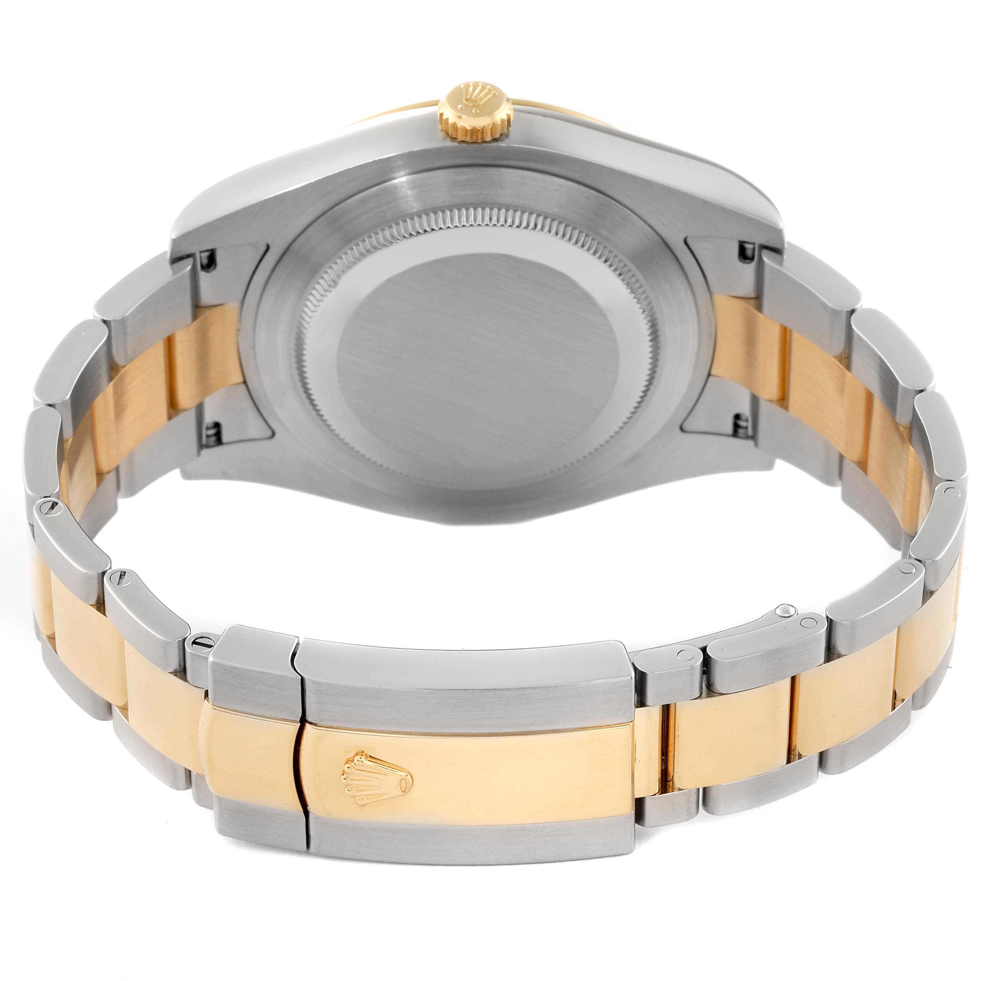 The image shows the back case and bracelet clasp of a Rolex Datejust 41 116333 Men's Steel and Gold (two tone) Grey Dial 116333 Men's Steel and Gold (two tone) Grey Dial watch, showcasing its two-tone metal design.