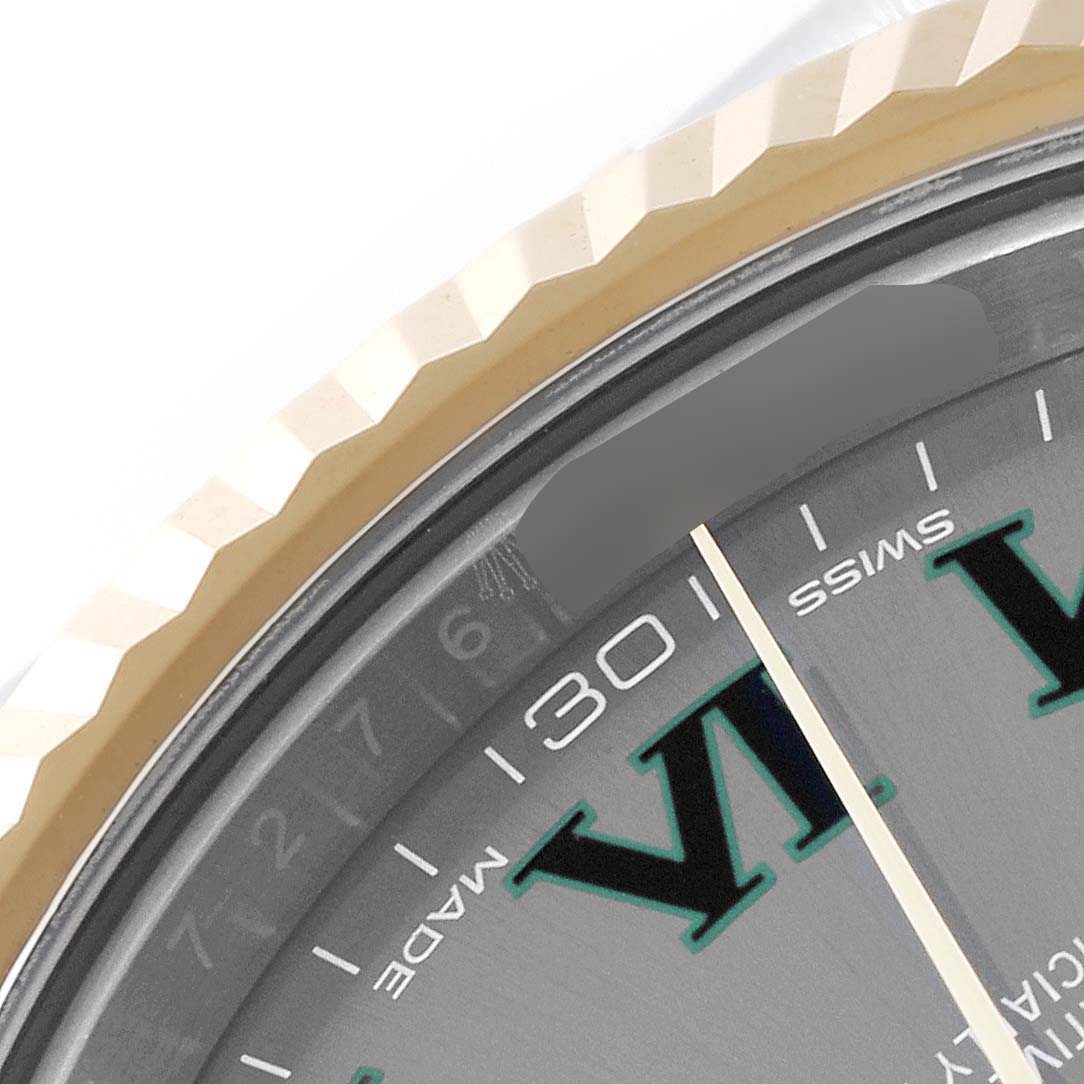 This close-up shows the bezel and a portion of the dial of the Rolex Datejust 41 116333 Men's Steel and Gold (two tone) Grey Dial 116333 Men's Steel and Gold (two tone) Grey Dial watch.